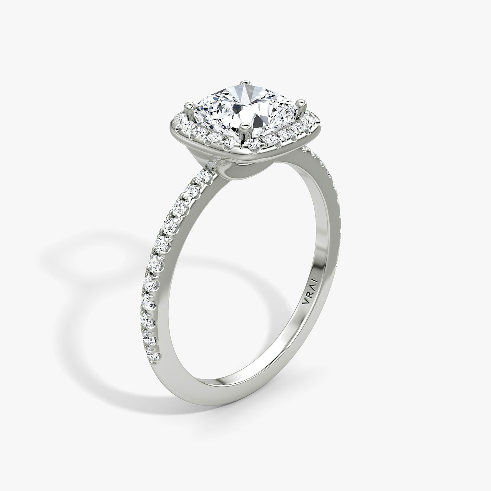 The Halo | Cushion | 18k | White Gold | bandAccent: Pavé | haloSize: original | diamondOrientation: vertical | caratWeight: other