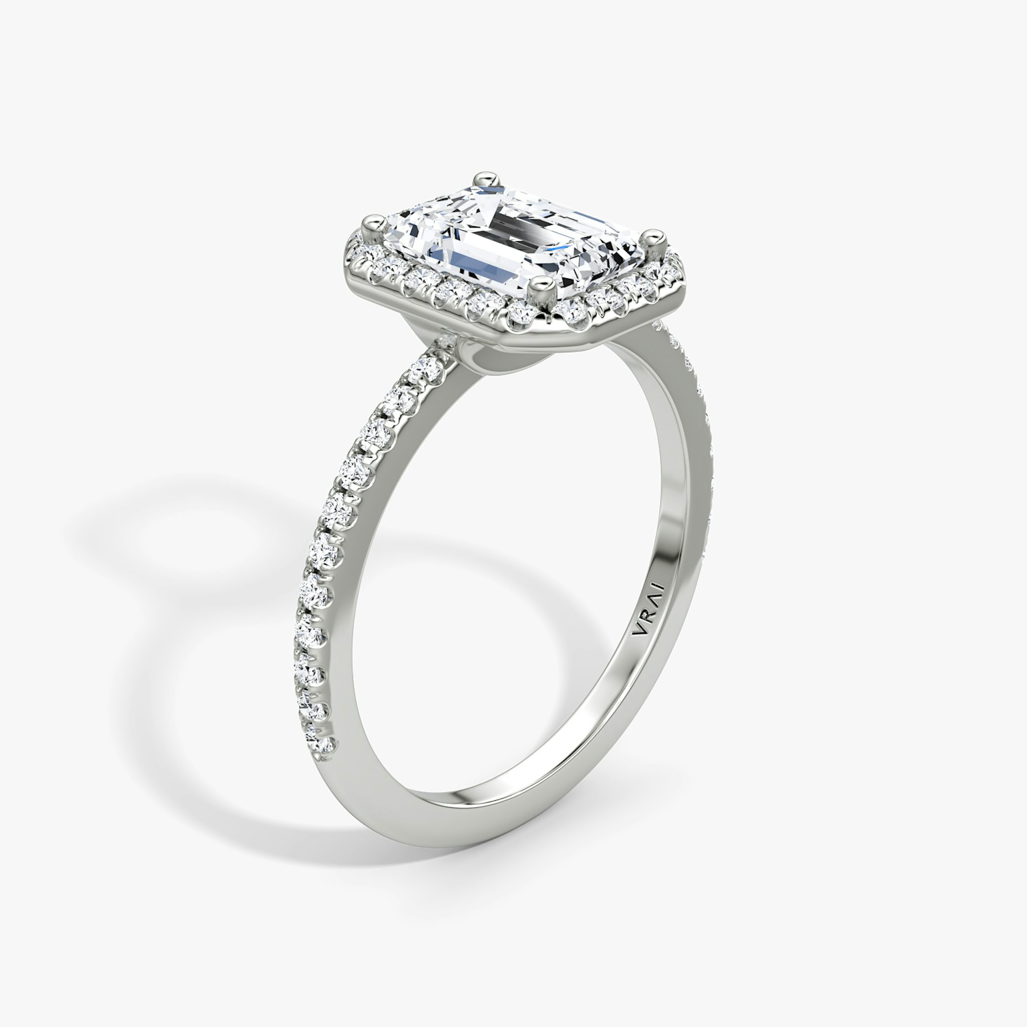 The Halo | Emerald | 18k | White Gold | bandAccent: Pavé | haloSize: original | diamondOrientation: vertical | caratWeight: other