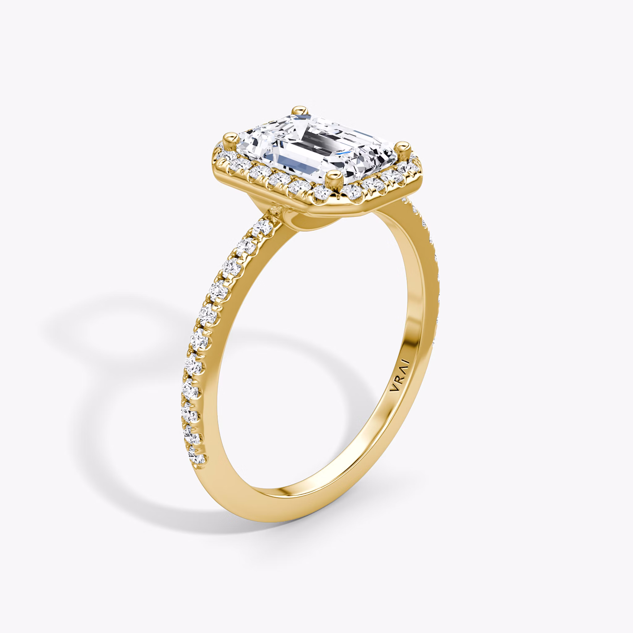 The Halo | Emerald | 18k | Yellow Gold | bandAccent: Pavé | haloSize: original | diamondOrientation: vertical | caratWeight: other