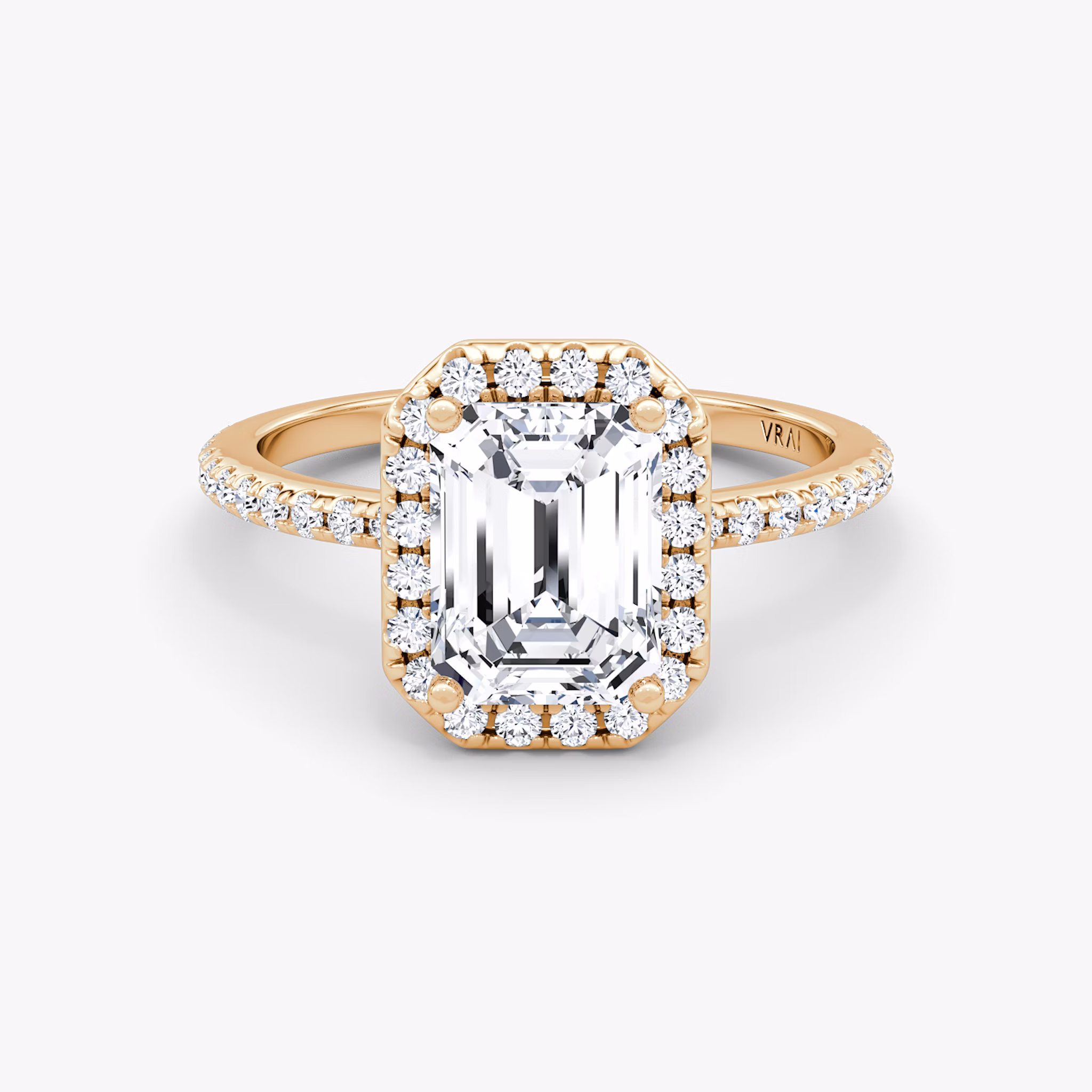 The Halo | Emerald | 14k | Rose Gold | bandAccent: Pavé | haloSize: original | diamondOrientation: vertical | caratWeight: other