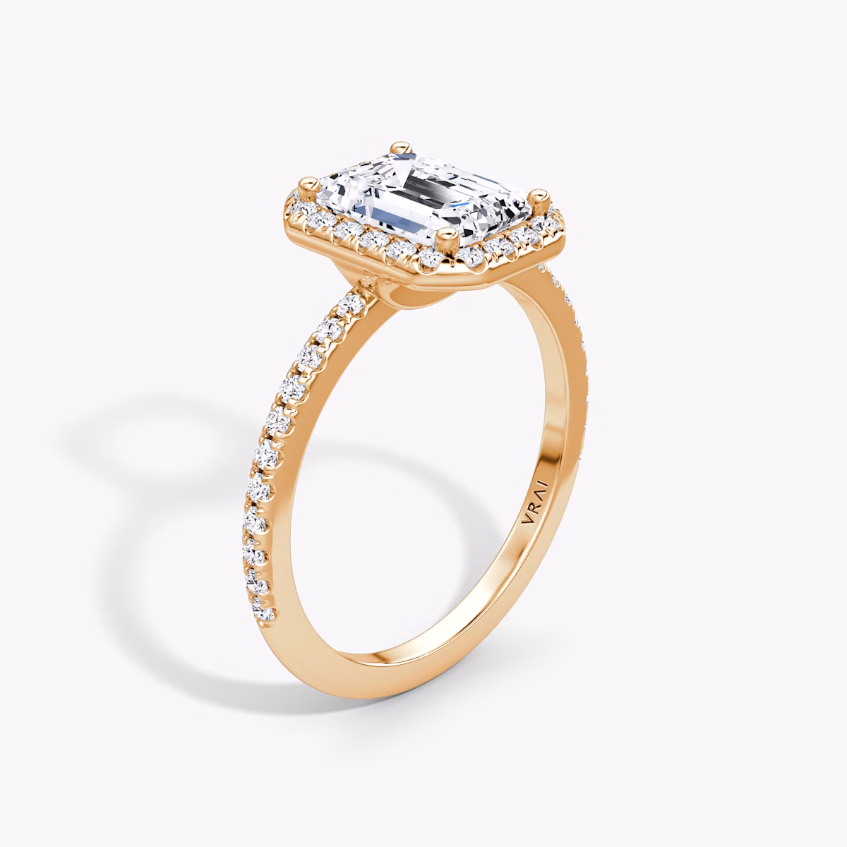 The Halo | Emerald | 14k | Rose Gold | bandAccent: Pavé | haloSize: original | diamondOrientation: vertical | caratWeight: other