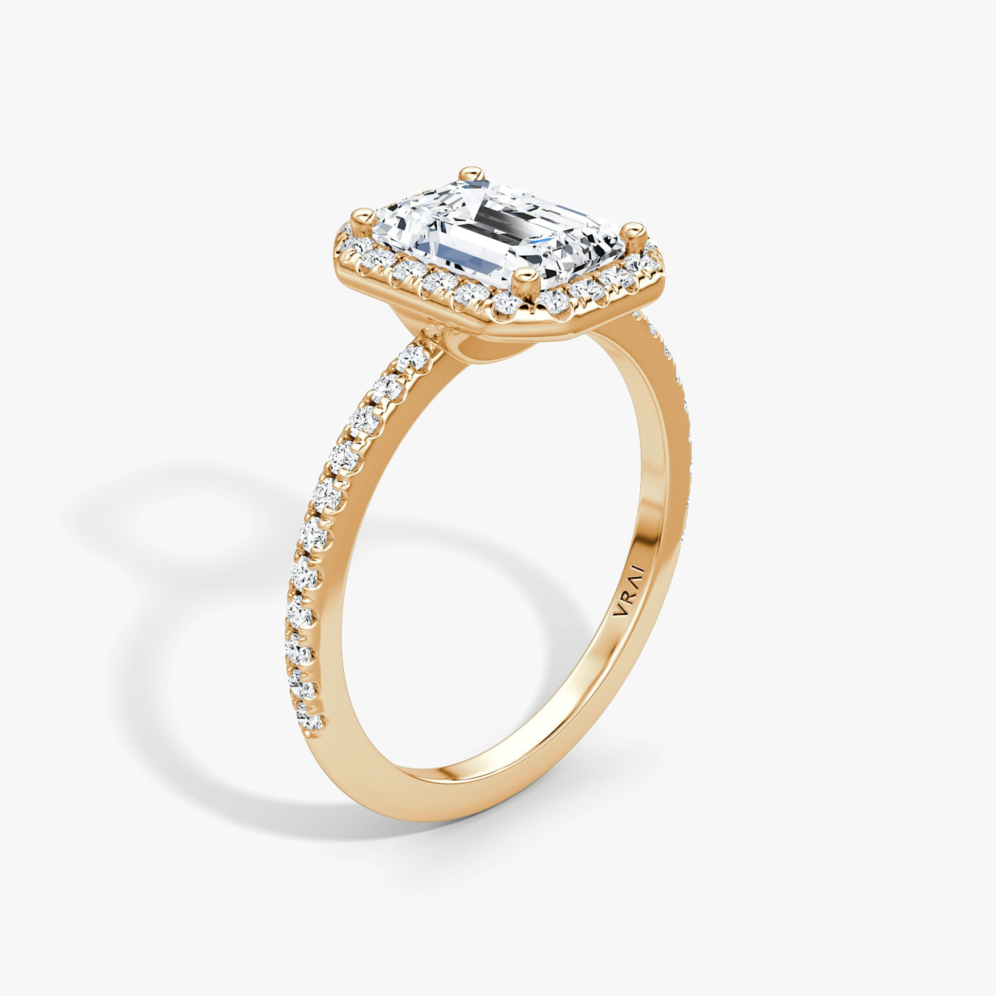 The Halo | Emerald | 14k | Rose Gold | bandAccent: Pavé | haloSize: original | diamondOrientation: vertical | caratWeight: other