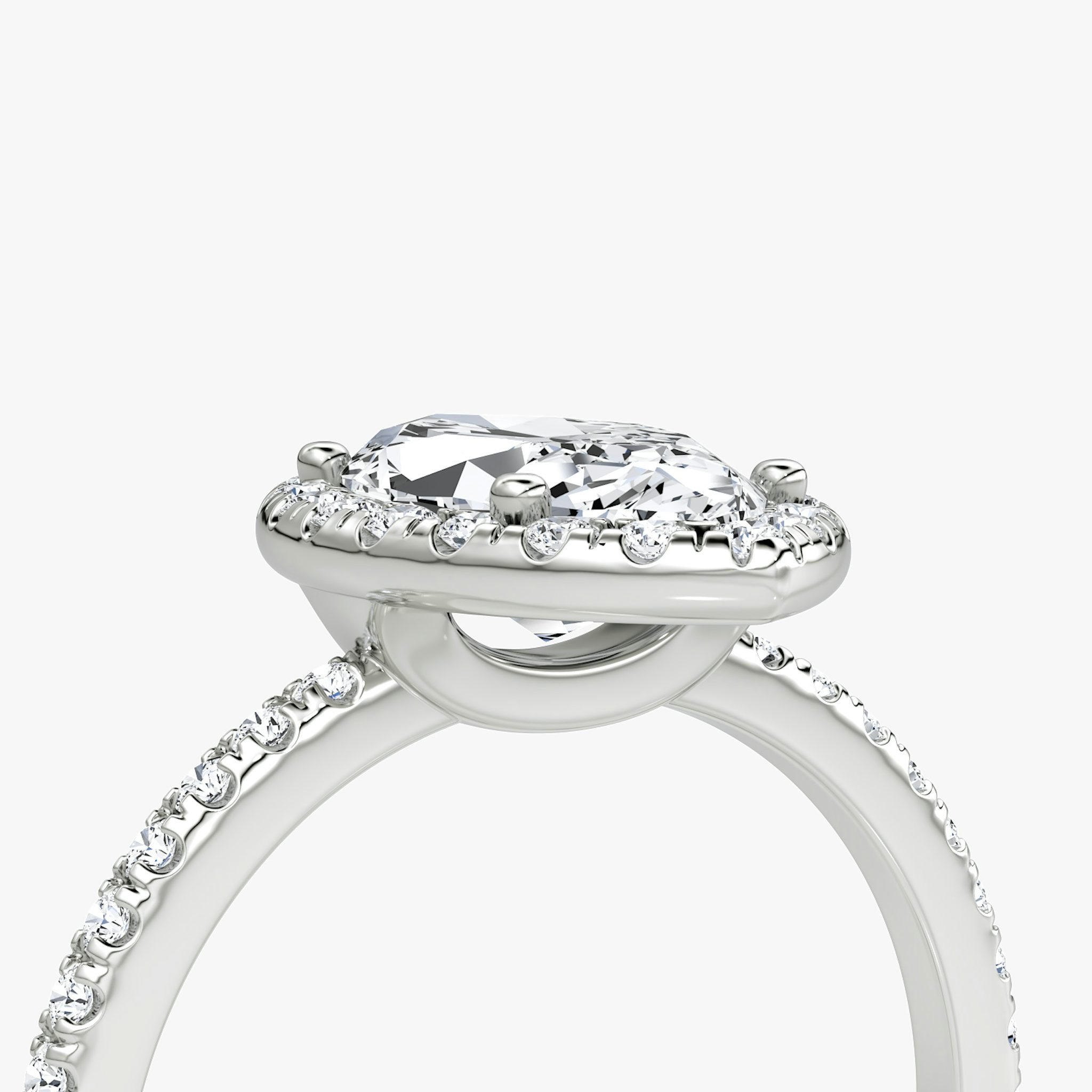 The Halo | Marquise | Platinum | bandAccent: Pavé | haloSize: original | diamondOrientation: vertical | caratWeight: other