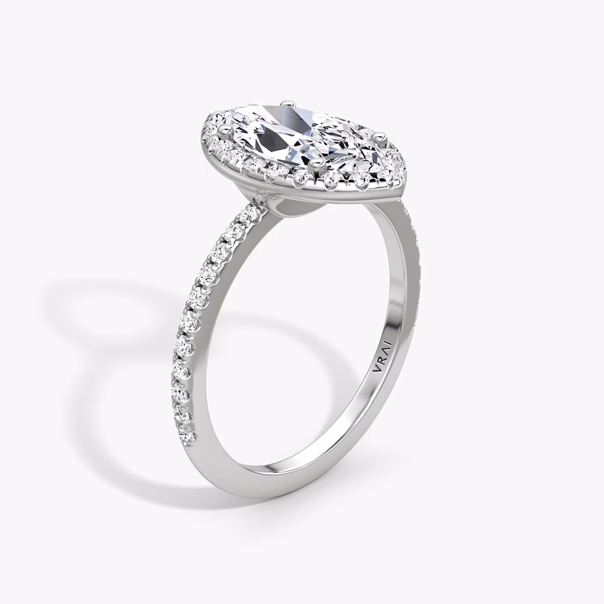 The Halo | Marquise | 18k | White Gold | bandAccent: Pavé | haloSize: original | diamondOrientation: vertical | caratWeight: other