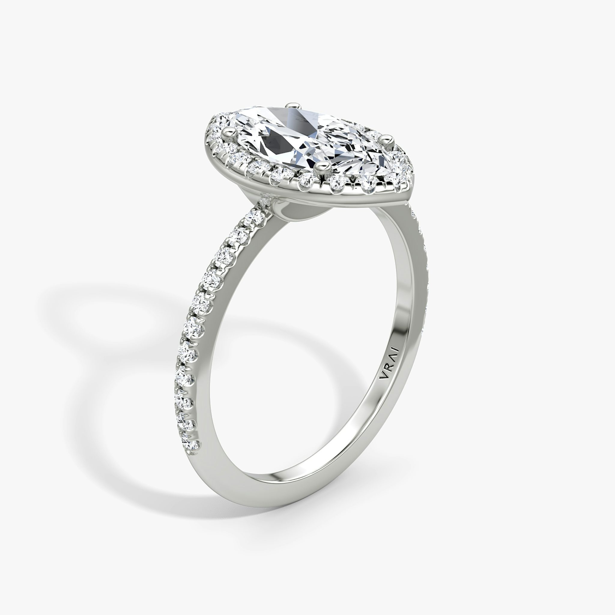 The Halo | Marquise | Platinum | bandAccent: Pavé | haloSize: original | diamondOrientation: vertical | caratWeight: other