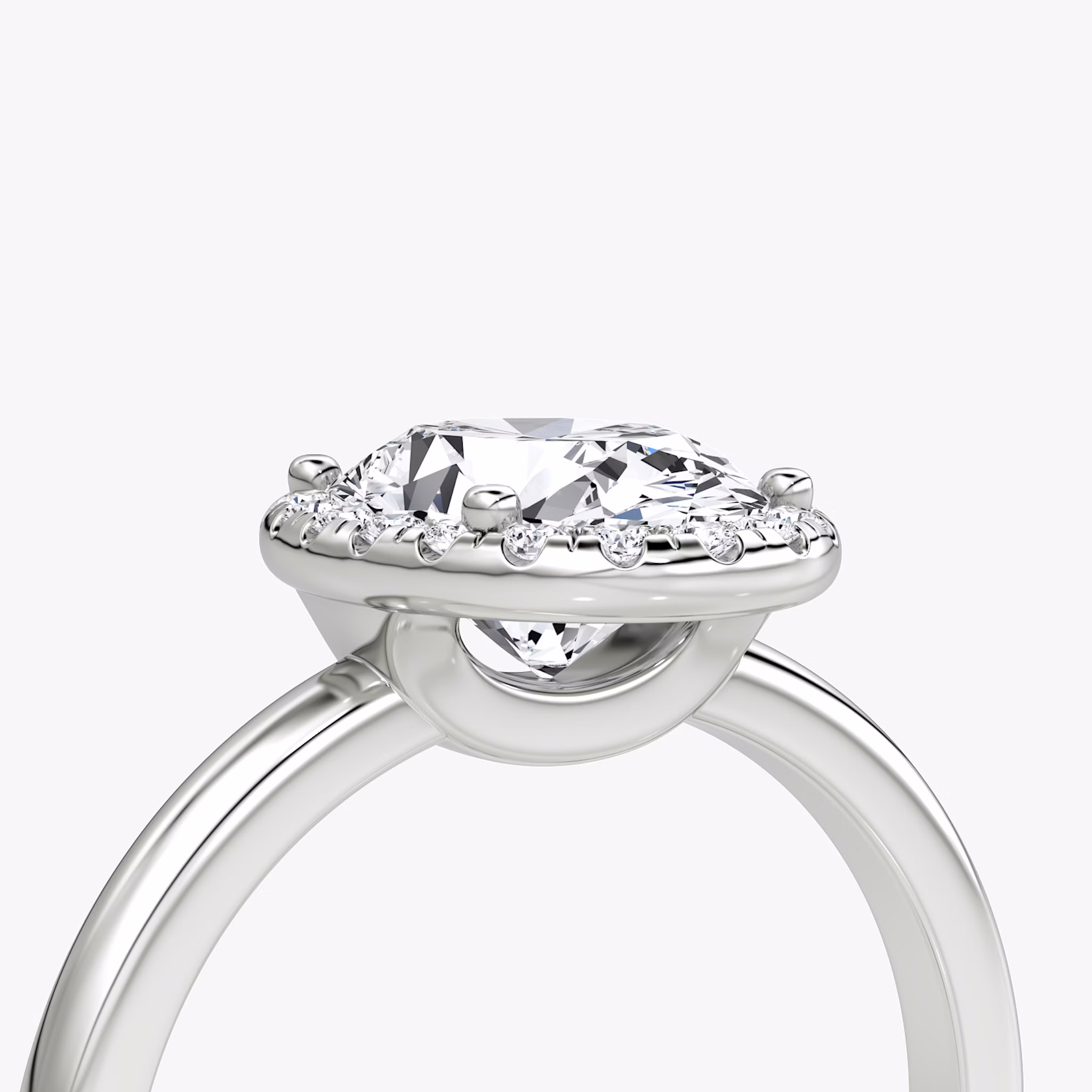The Halo | Oval | Platinum | bandAccent: Plain | haloSize: original | diamondOrientation: vertical | caratWeight: other