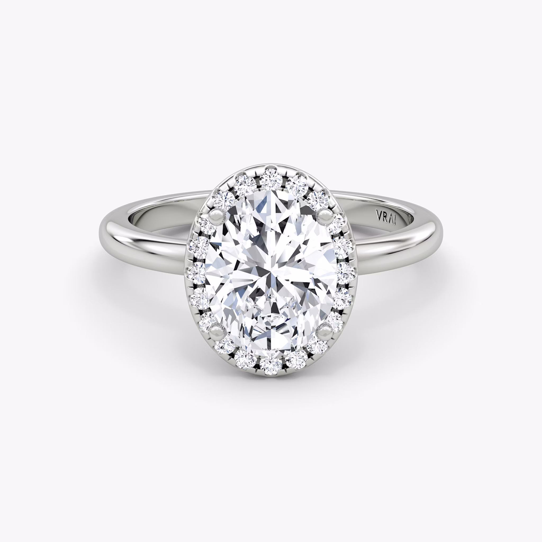 The Halo | Oval | Platinum | bandAccent: Plain | haloSize: original | diamondOrientation: vertical | caratWeight: other