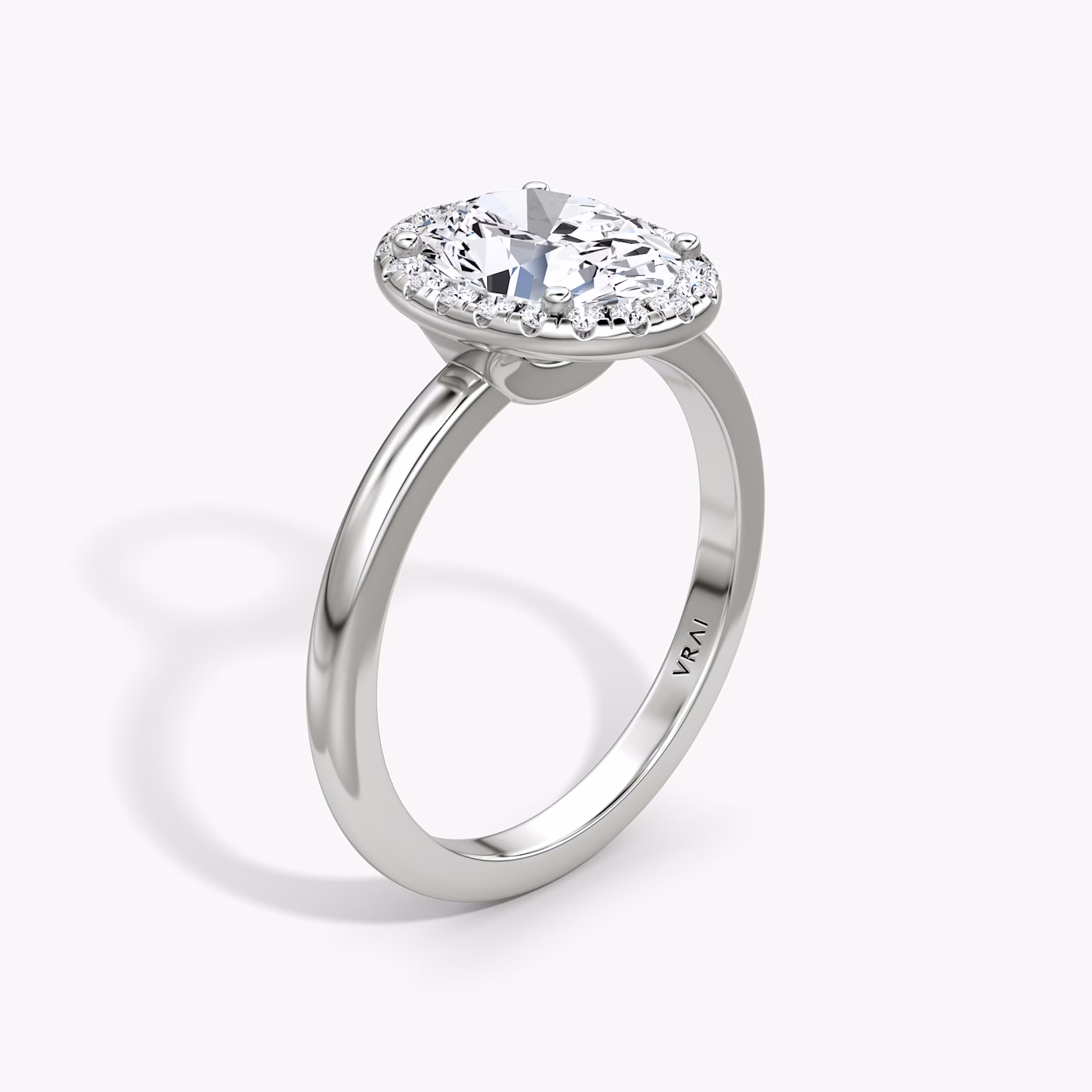 The Halo | Oval | Platinum | bandAccent: Plain | haloSize: original | diamondOrientation: vertical | caratWeight: other