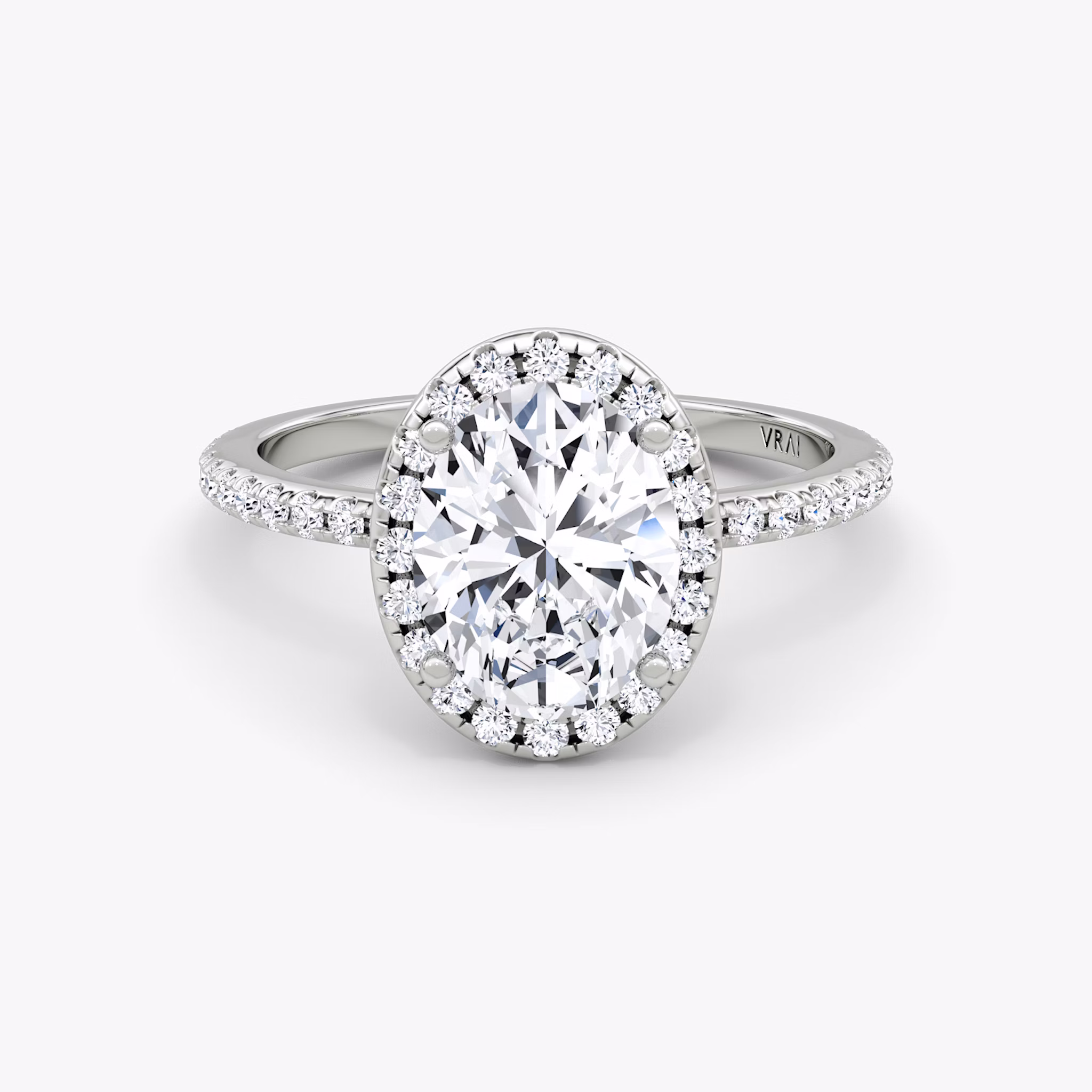The Halo | Oval | 18k | White Gold | bandAccent: Pavé | haloSize: original | diamondOrientation: vertical | caratWeight: other