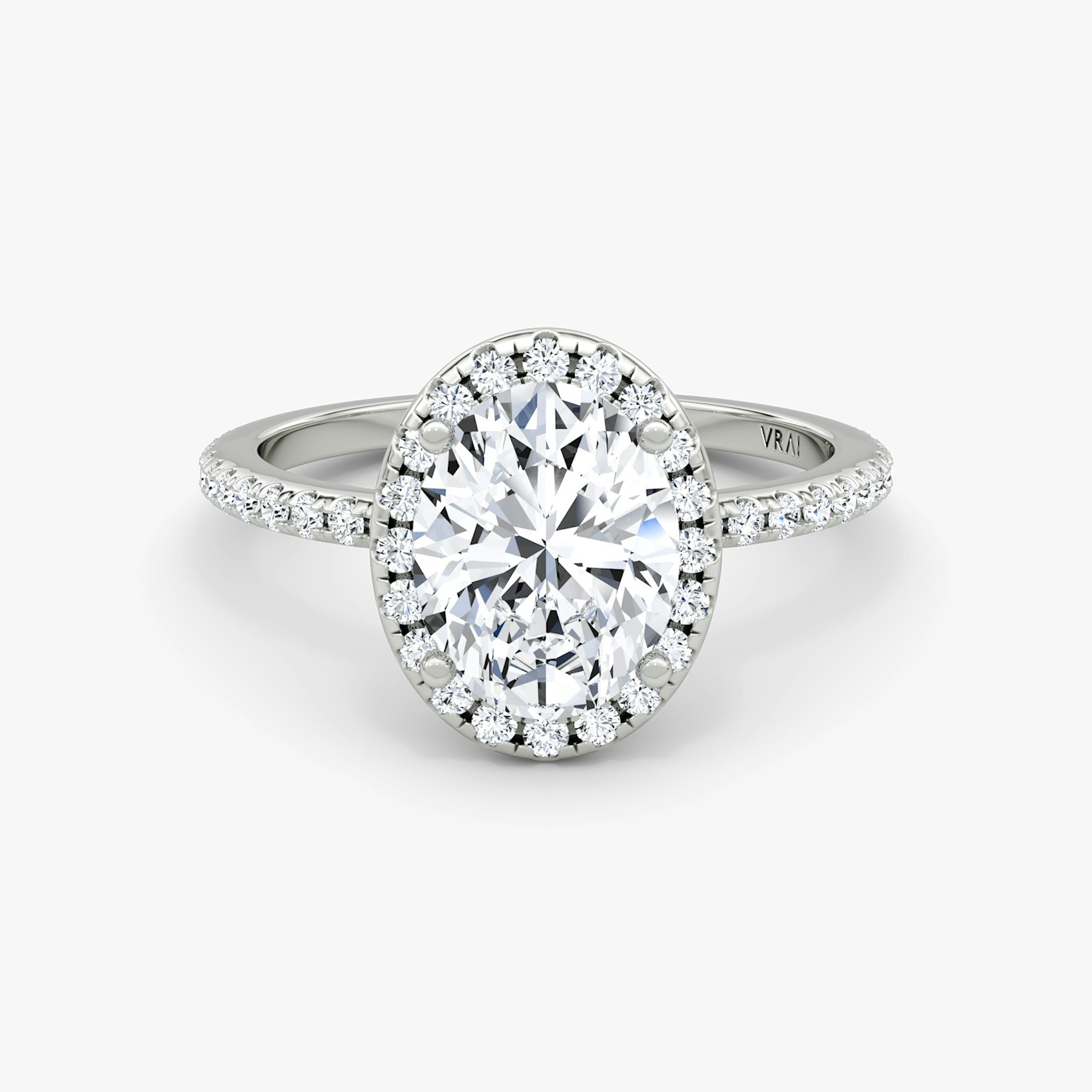 The Halo | Oval | 18k | White Gold | bandAccent: Pavé | haloSize: original | diamondOrientation: vertical | caratWeight: other