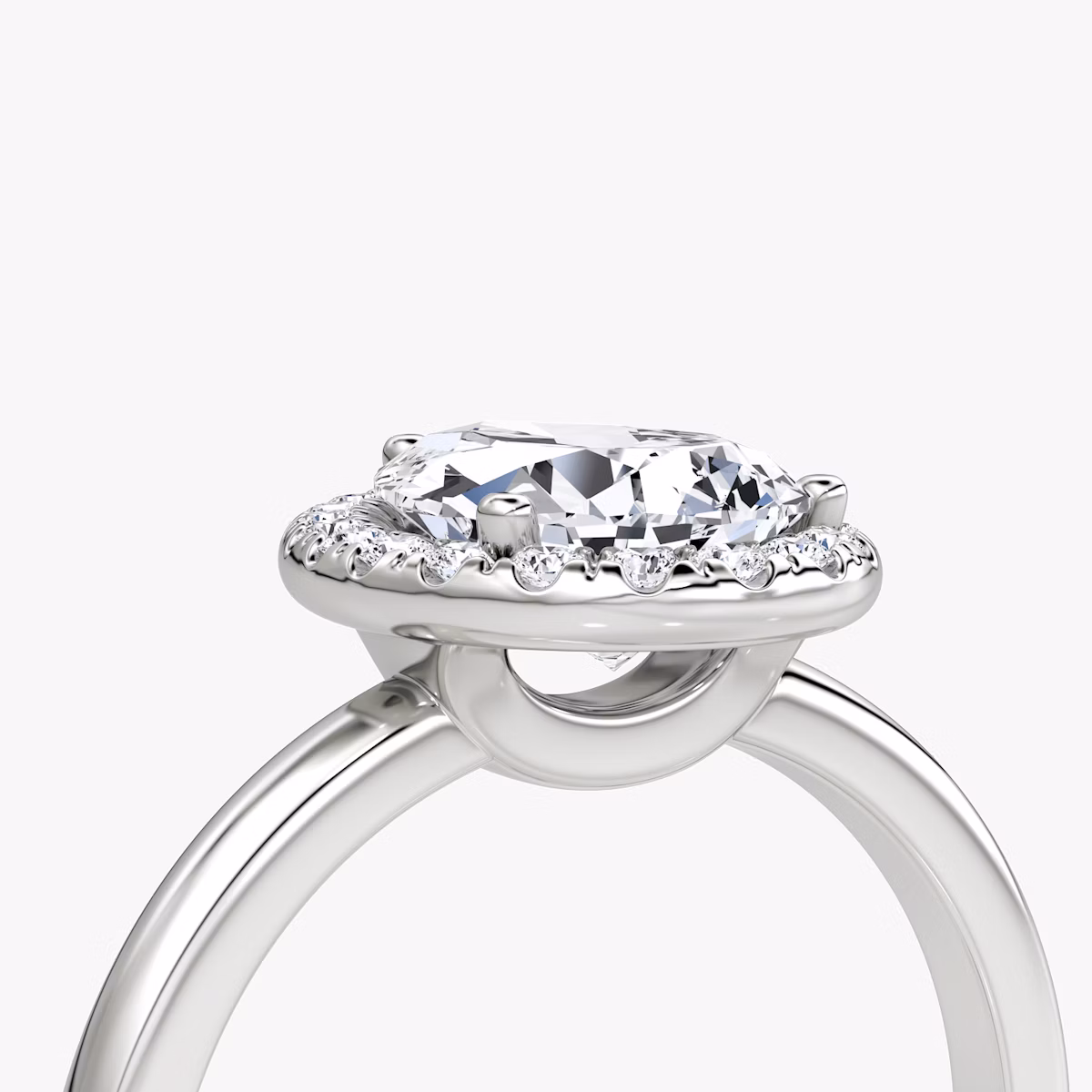 The Halo | Pear | Platinum | bandAccent: Plain | haloSize: original | diamondOrientation: vertical | caratWeight: other