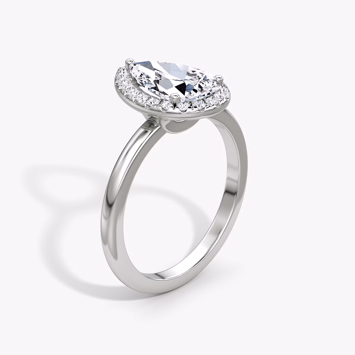 The Halo | Pear | Platinum | bandAccent: Plain | haloSize: original | diamondOrientation: vertical | caratWeight: other