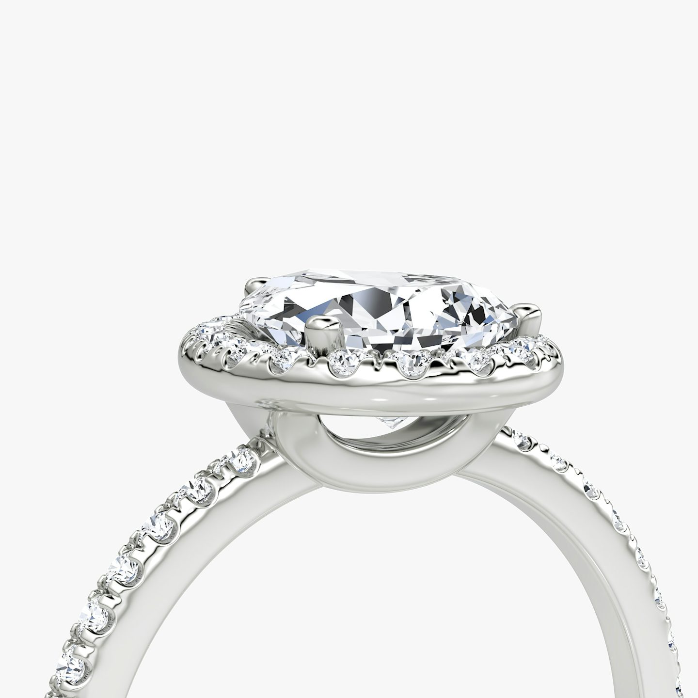 The Halo | Pear | Platinum | bandAccent: Pavé | haloSize: original | diamondOrientation: vertical | caratWeight: other
