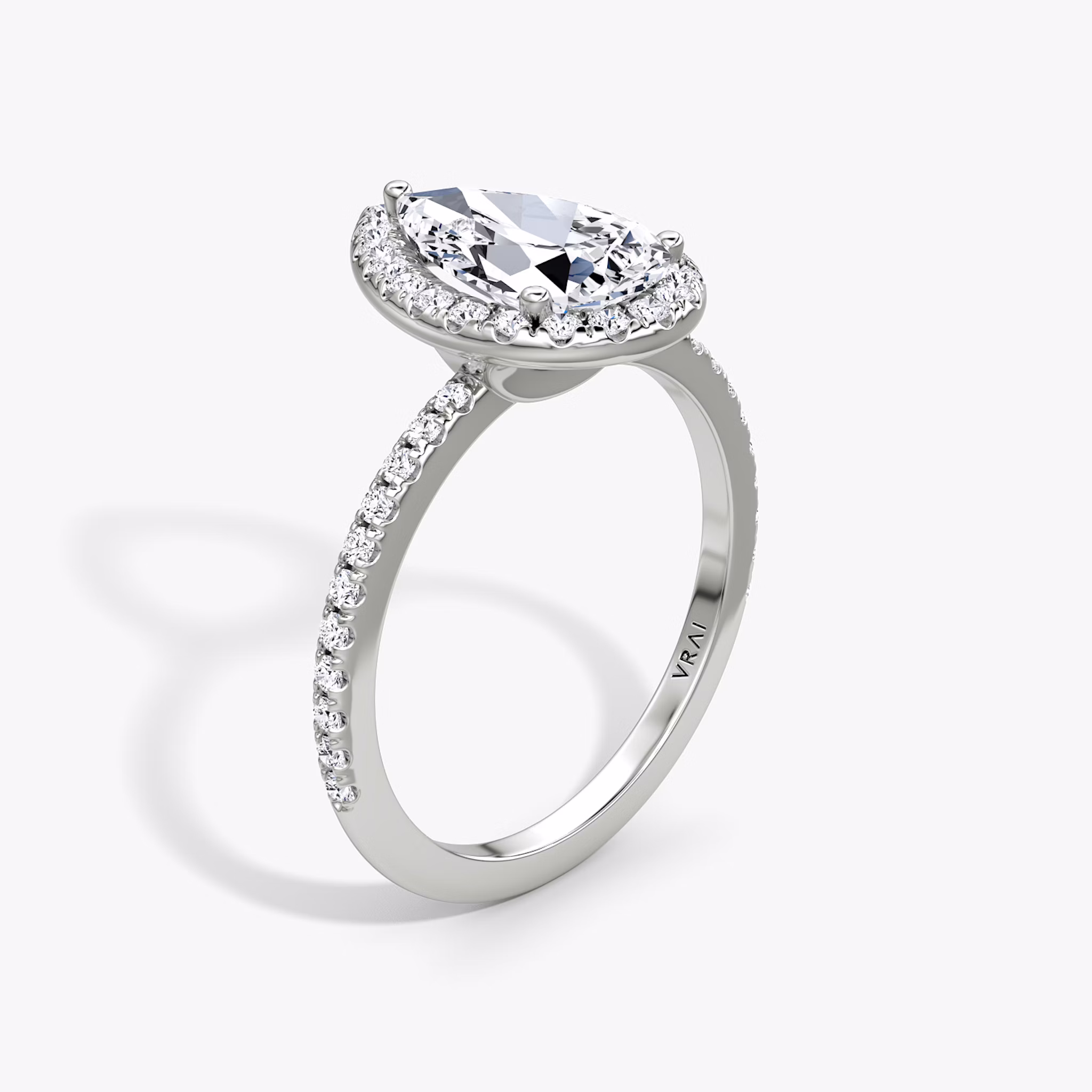 The Halo | Pear | 18k | White Gold | bandAccent: Pavé | haloSize: original | diamondOrientation: vertical | caratWeight: other