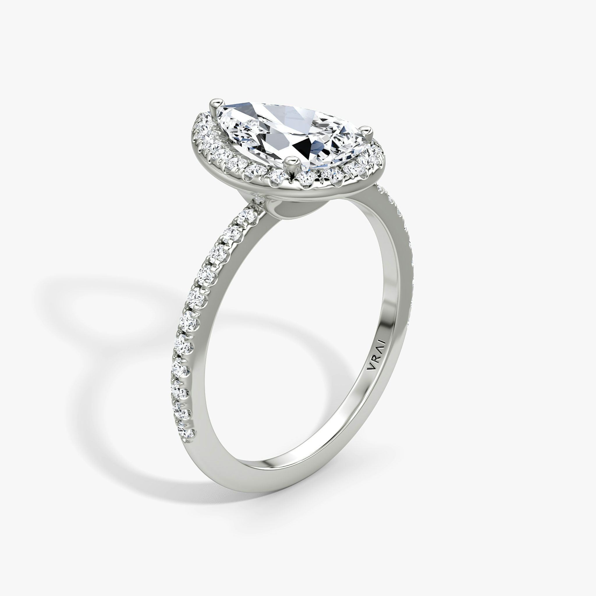 The Halo | Pear | 18k | White Gold | bandAccent: Pavé | haloSize: original | diamondOrientation: vertical | caratWeight: other