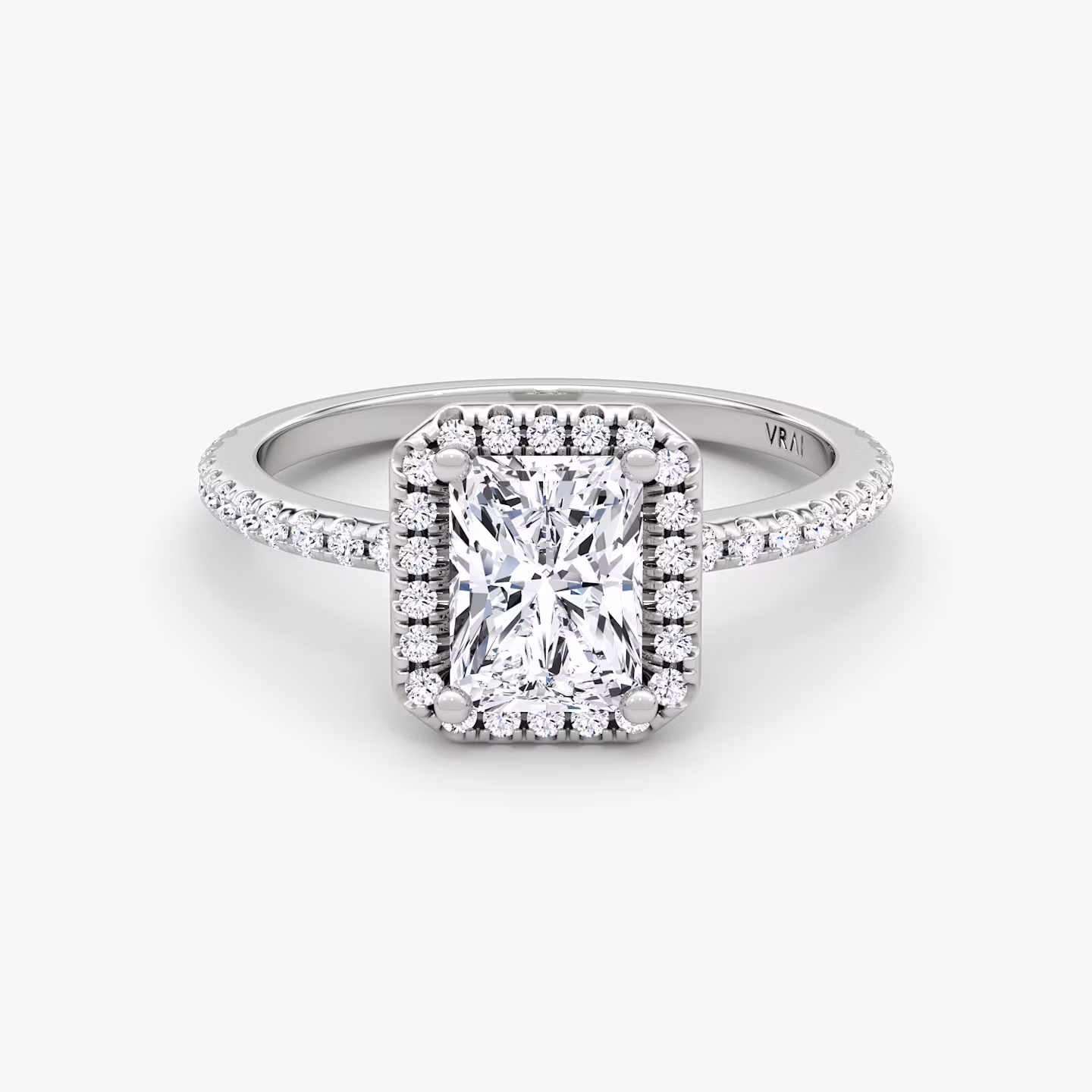 The Halo | Radiant | Platinum | bandAccent: Pavé | haloSize: original | diamondOrientation: vertical | caratWeight: other