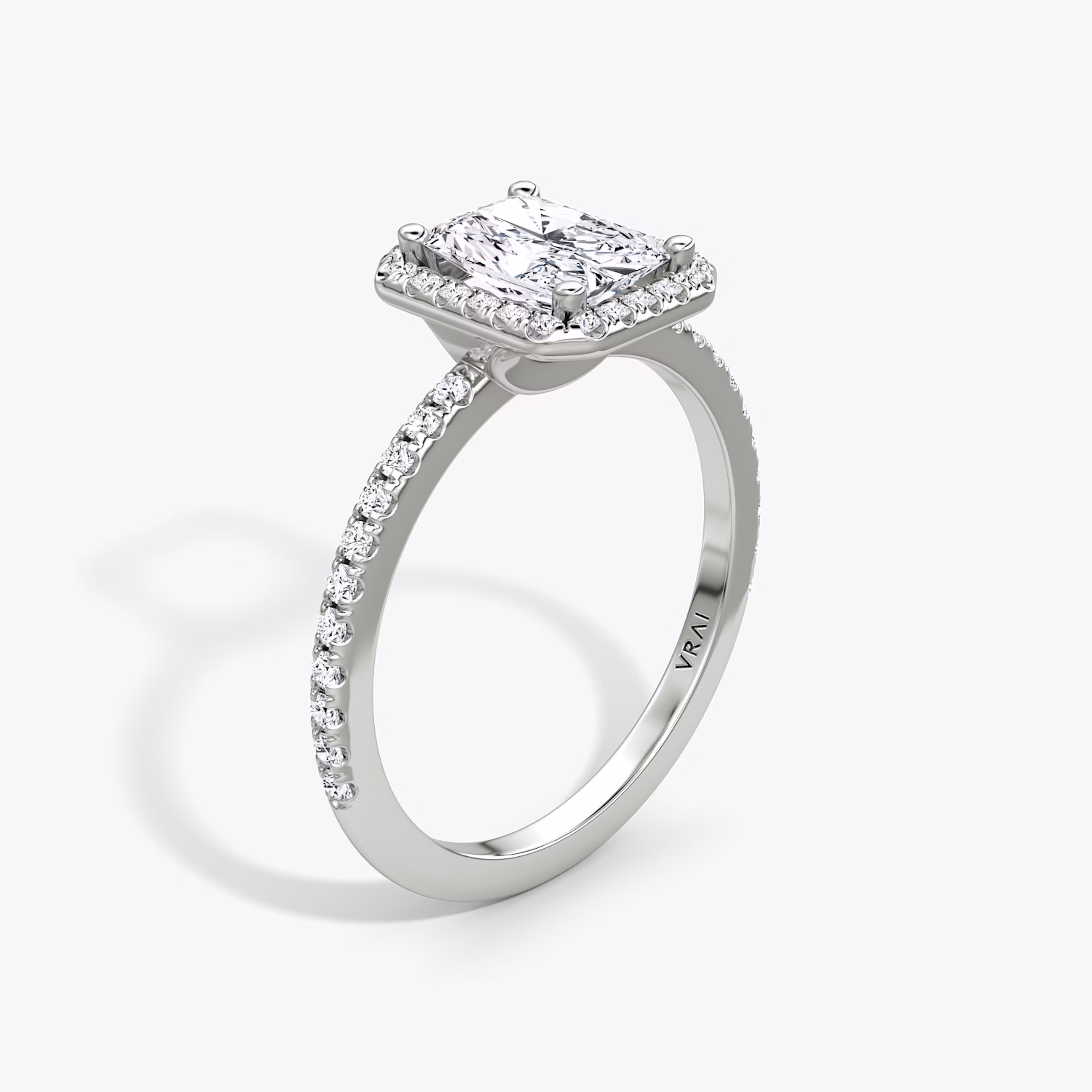 The Halo | Radiant | 18k | White Gold | bandAccent: Pavé | haloSize: original | diamondOrientation: vertical | caratWeight: other