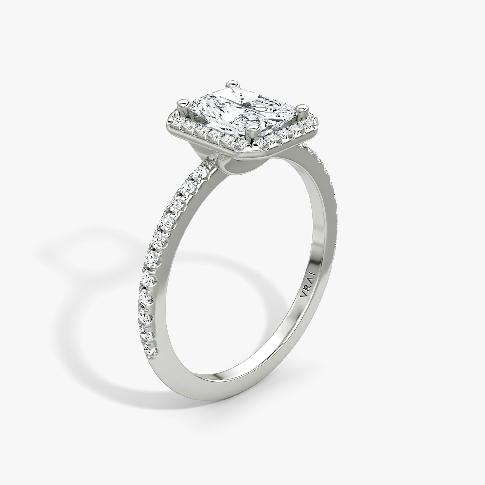 The Halo | Radiant | 18k | White Gold | bandAccent: Pavé | haloSize: original | diamondOrientation: vertical | caratWeight: other