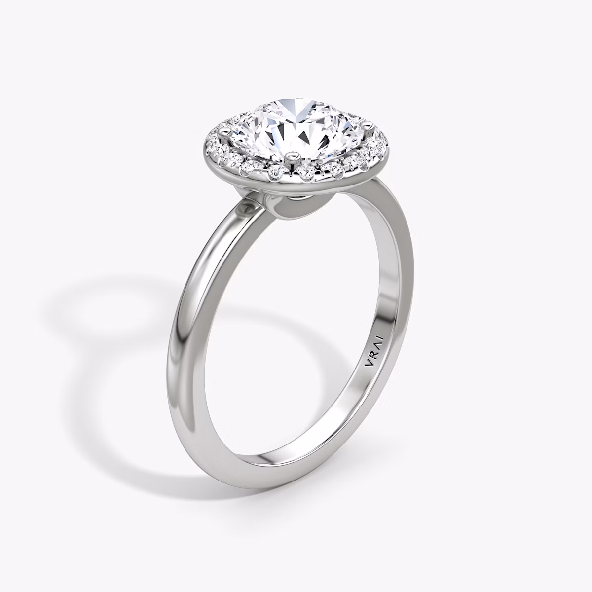 The Halo | Round Brilliant | 18k | White Gold | bandAccent: Plain | caratWeight: 1.5ct | haloSize: original | diamondOrientation: vertical