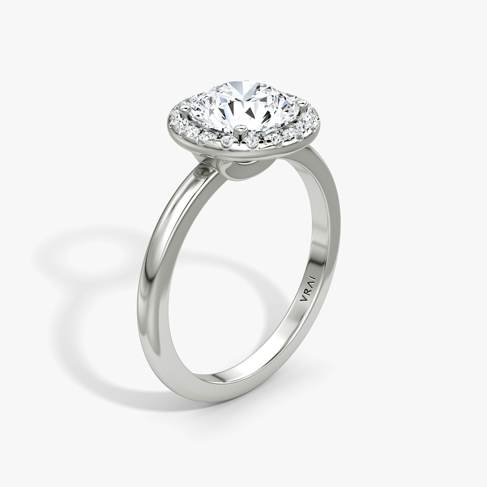 The Halo | Round Brilliant | 18k | White Gold | bandAccent: Plain | caratWeight: other | haloSize: original | diamondOrientation: vertical