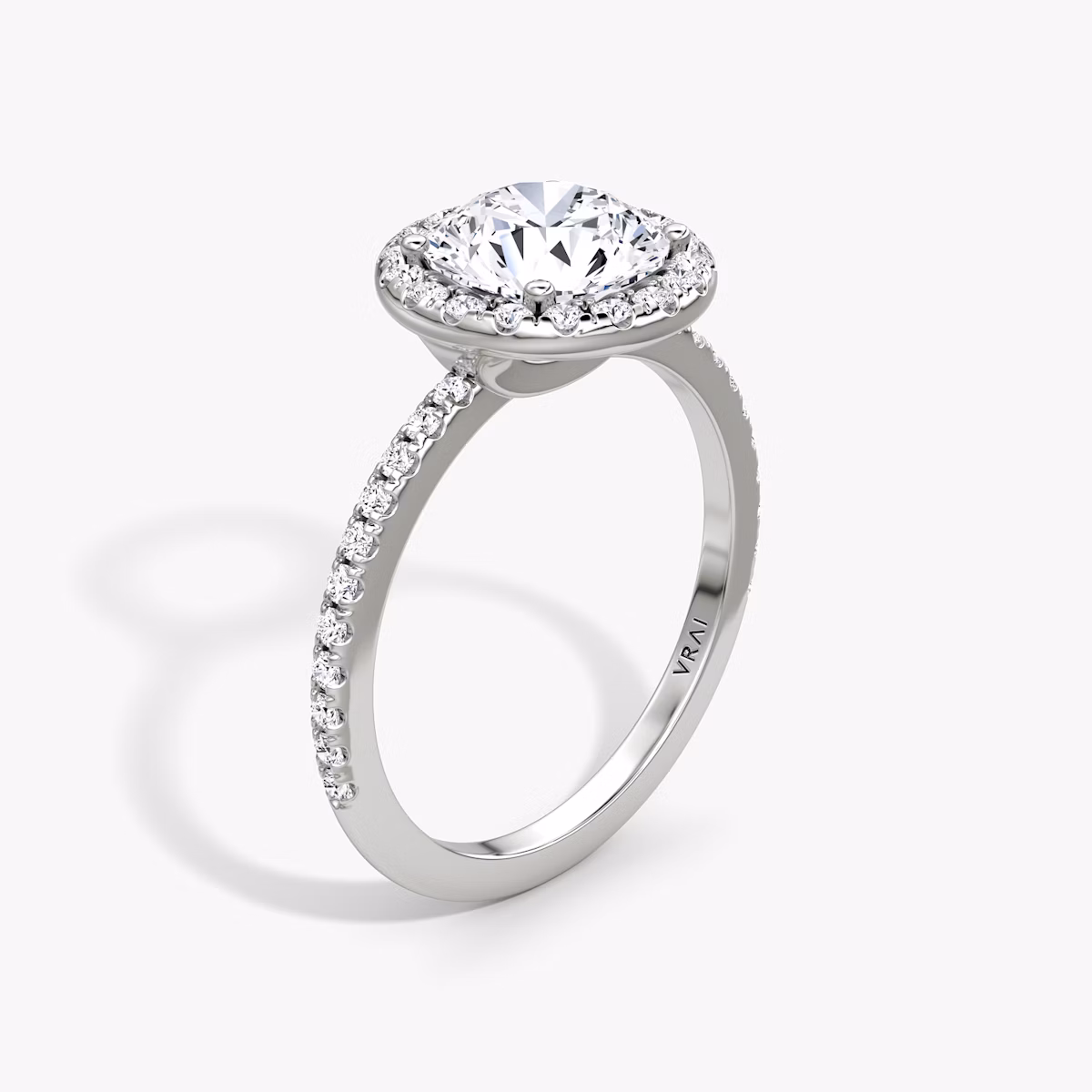 The Halo | Round Brilliant | 18k | White Gold | bandAccent: Pavé | caratWeight: 2.0ct | haloSize: original | diamondOrientation: vertical