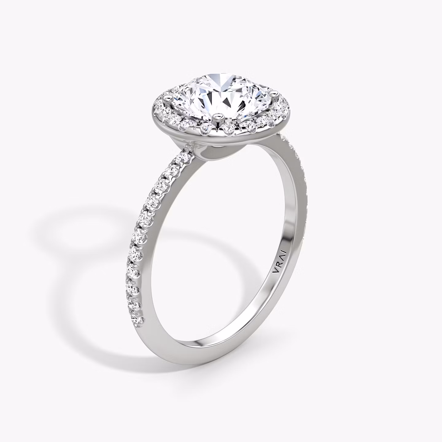 The Halo | Round Brilliant | 18k | White Gold | bandAccent: Pavé | caratWeight: 2.0ct | haloSize: original | diamondOrientation: vertical