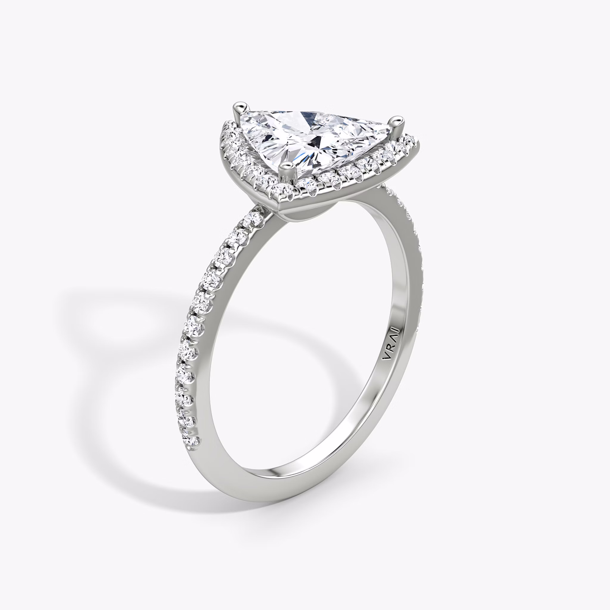 The Halo | Trillion | Platinum | bandAccent: Pavé | haloSize: original | diamondOrientation: vertical | caratWeight: other