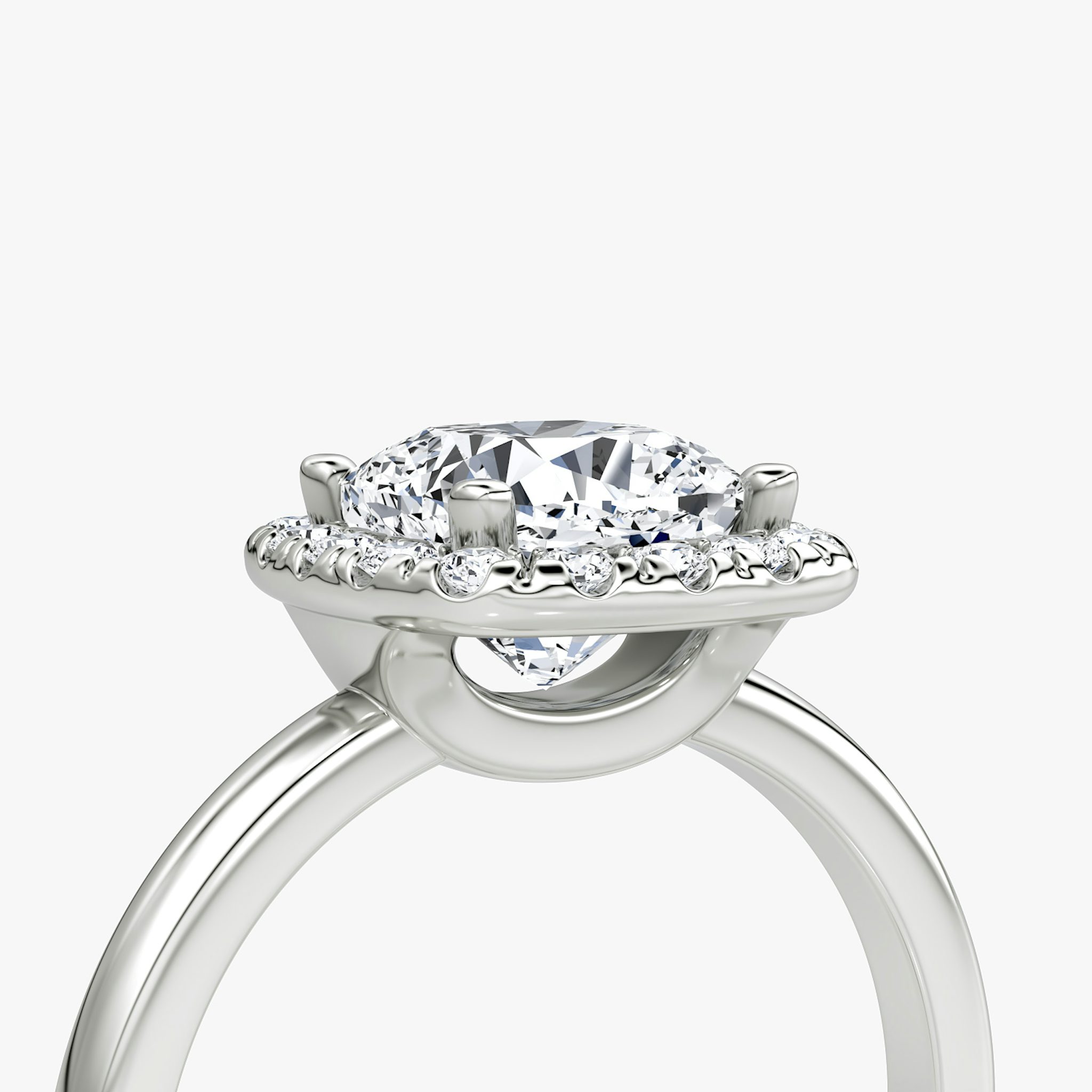 The Halo | Cushion | Platinum | bandAccent: Plain | haloSize: large | diamondOrientation: vertical | caratWeight: other
