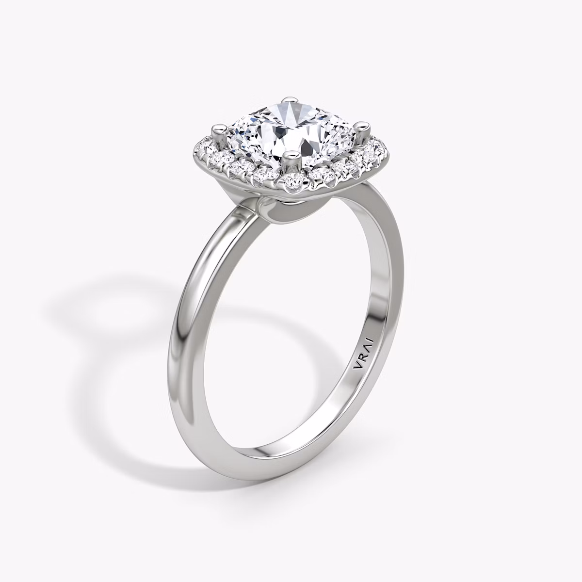 The Halo | Cushion | Platinum | bandAccent: Plain | haloSize: large | diamondOrientation: vertical | caratWeight: other