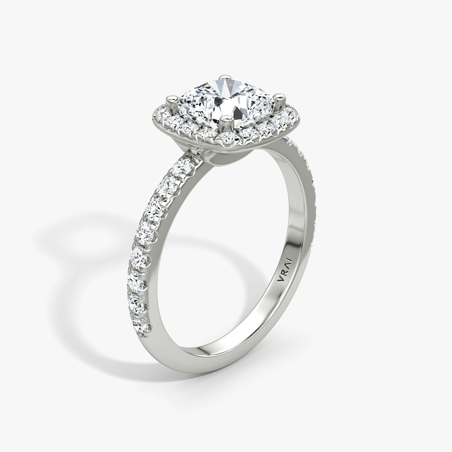 The Halo | Cushion | Platinum | bandAccent: Pavé | haloSize: large | diamondOrientation: vertical | caratWeight: other