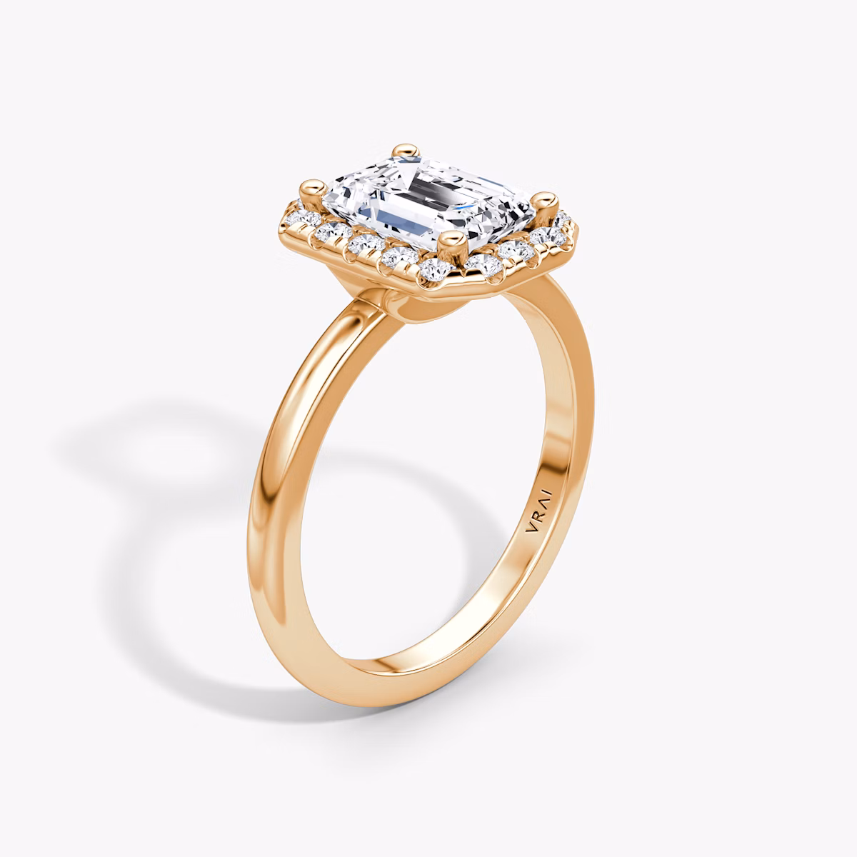 The Halo | Emerald | 14k | Rose Gold | bandAccent: Plain | haloSize: large | diamondOrientation: vertical | caratWeight: other