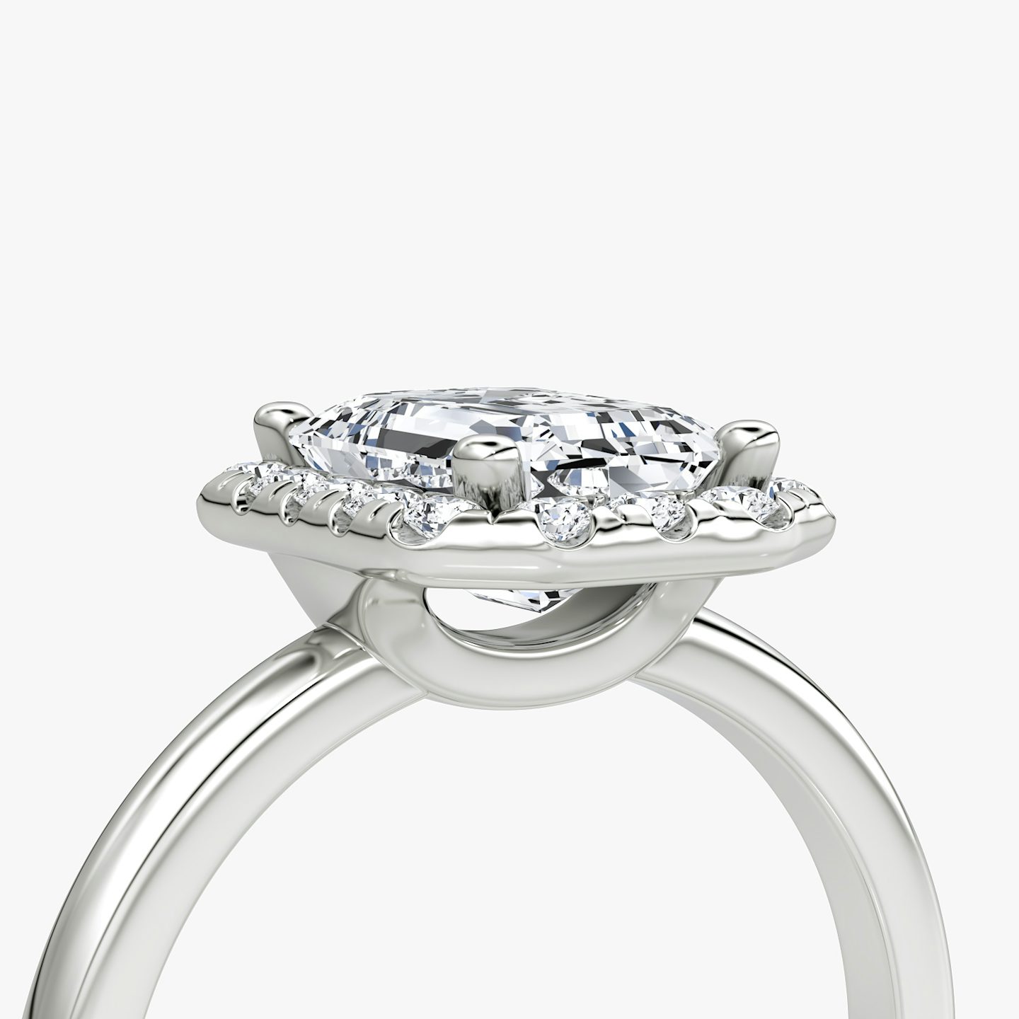The Halo | Emerald | Platinum | bandAccent: Plain | haloSize: large | diamondOrientation: vertical | caratWeight: other