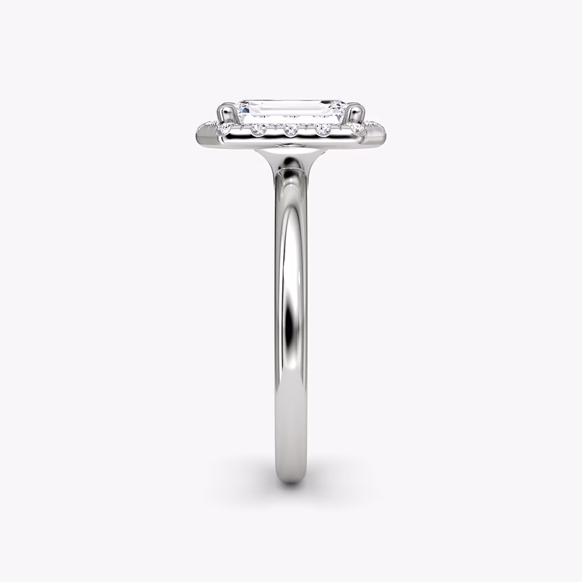 The Halo | Emerald | Platinum | bandAccent: Plain | haloSize: large | diamondOrientation: vertical | caratWeight: other