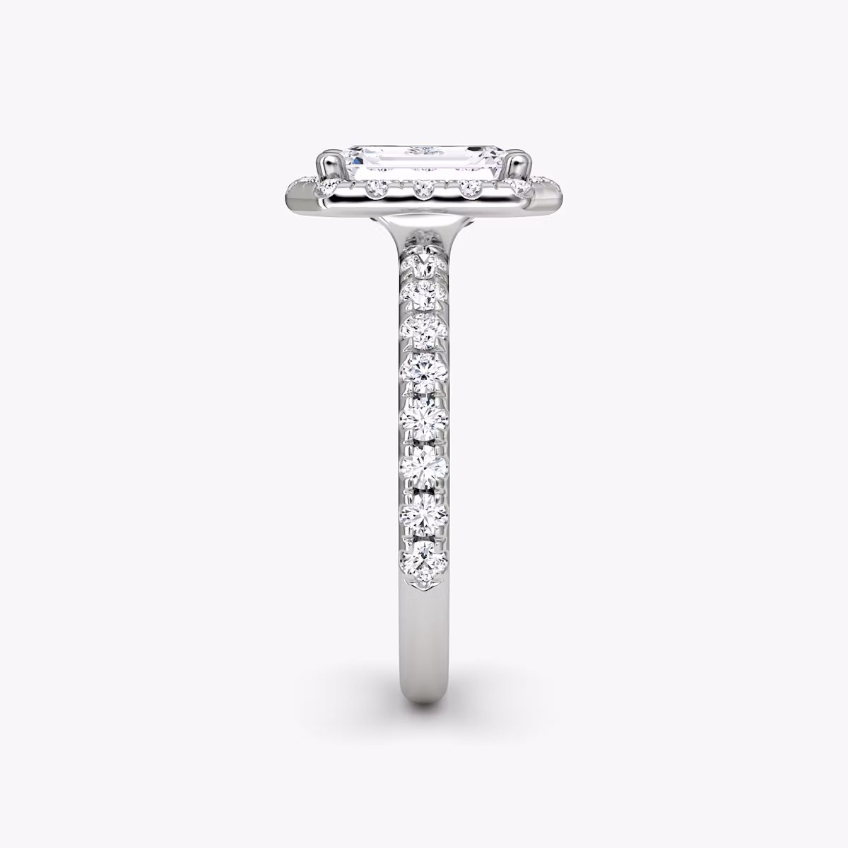 The Halo | Emerald | Platinum | bandAccent: Pavé | haloSize: large | diamondOrientation: vertical | caratWeight: other