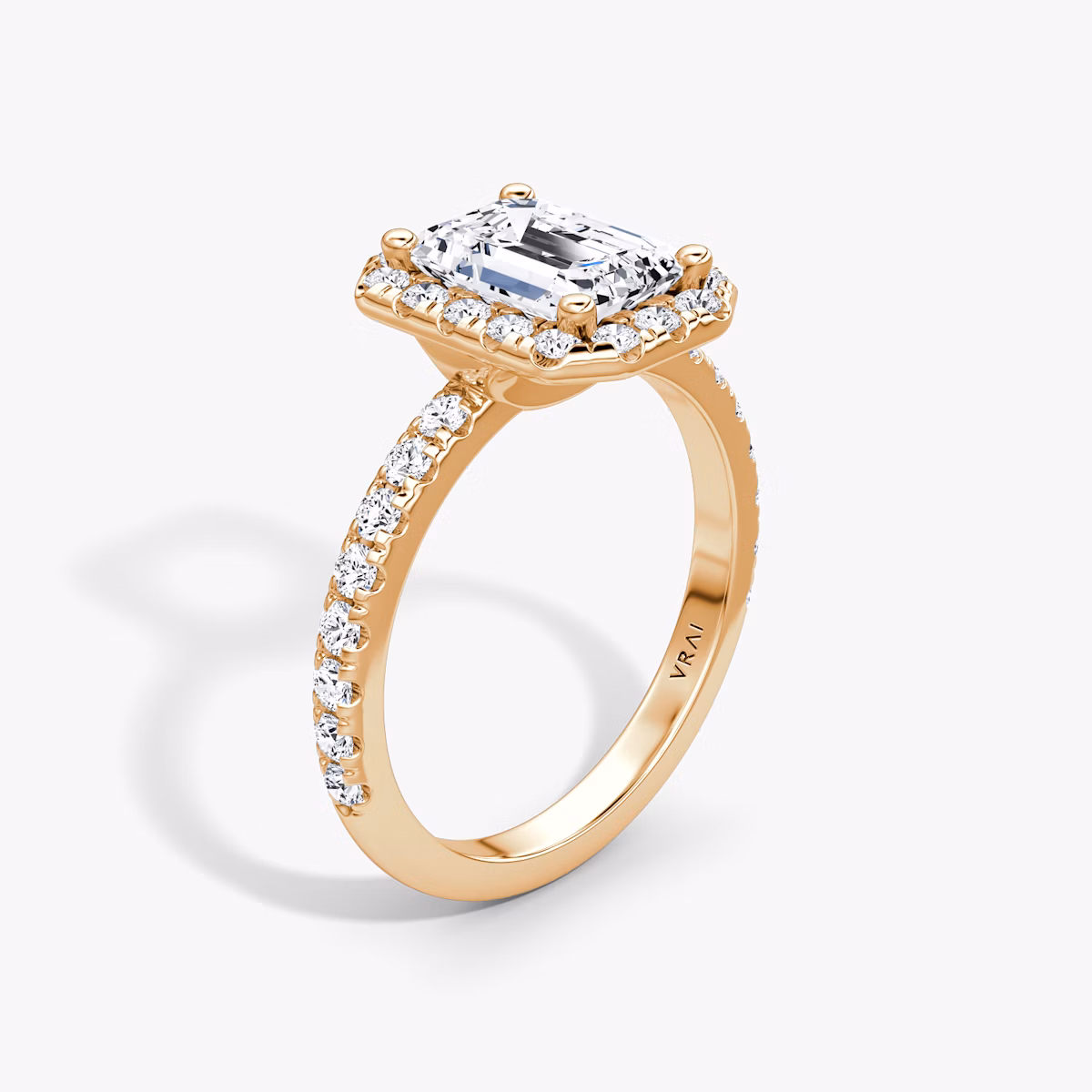 The Halo | Emerald | 14k | Rose Gold | bandAccent: Pavé | haloSize: large | diamondOrientation: vertical | caratWeight: other