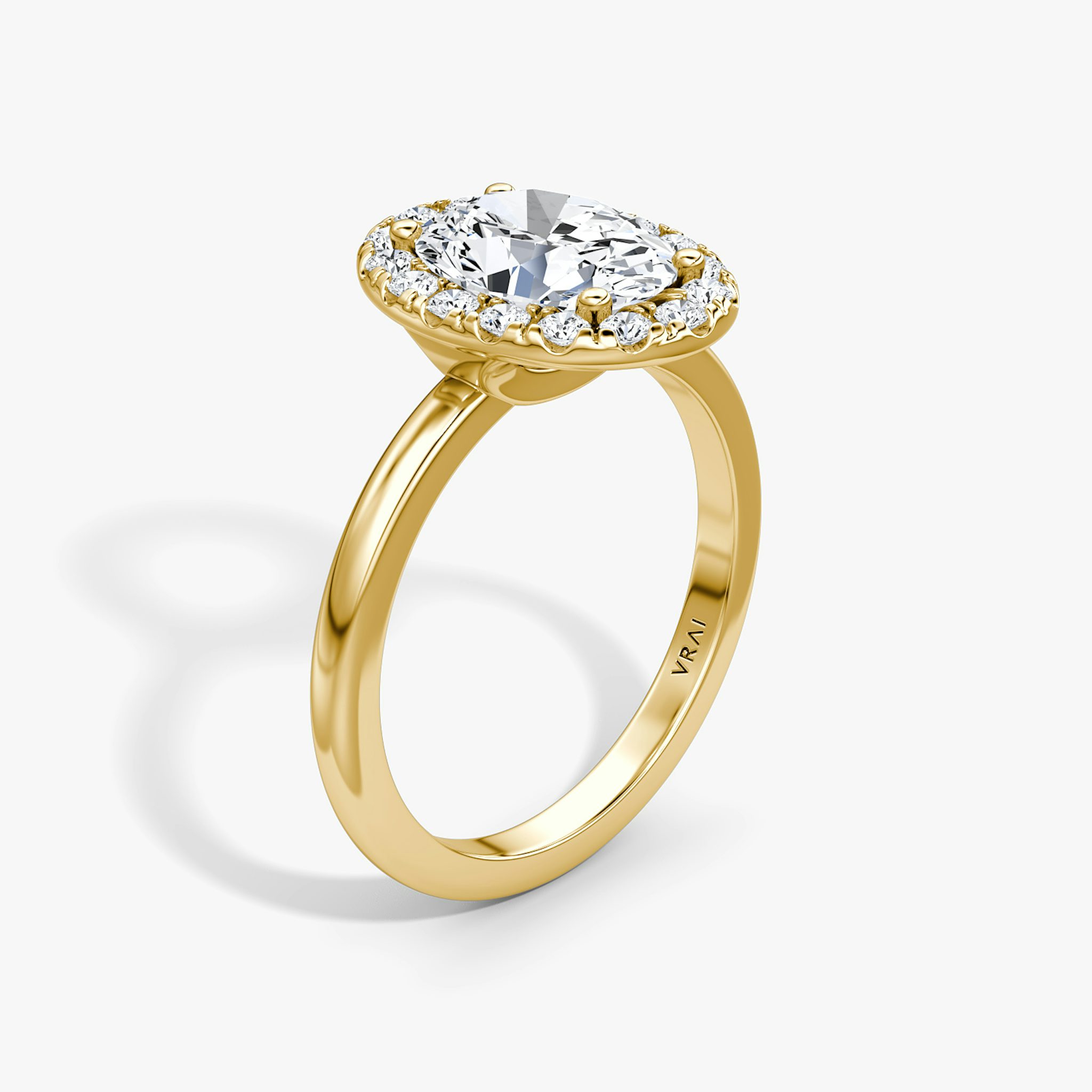 The Halo | Oval | 18k | Yellow Gold | bandAccent: Plain | haloSize: large | diamondOrientation: vertical | caratWeight: other