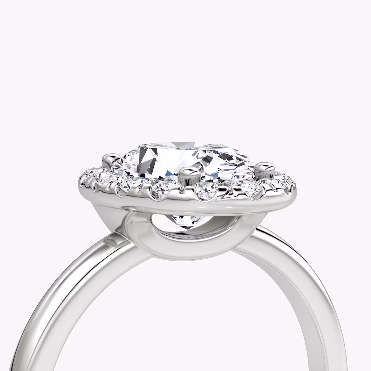 The Halo | Oval | Platinum | bandAccent: Plain | haloSize: large | diamondOrientation: vertical | caratWeight: other