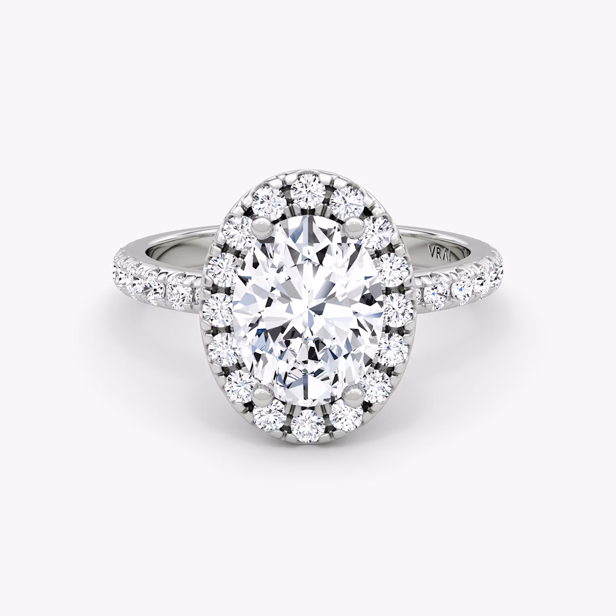 Anillo de compromiso Halo | Oval | Platino | bandAccent: Pavé | haloSize: large | diamondOrientation: vertical | caratWeight: other