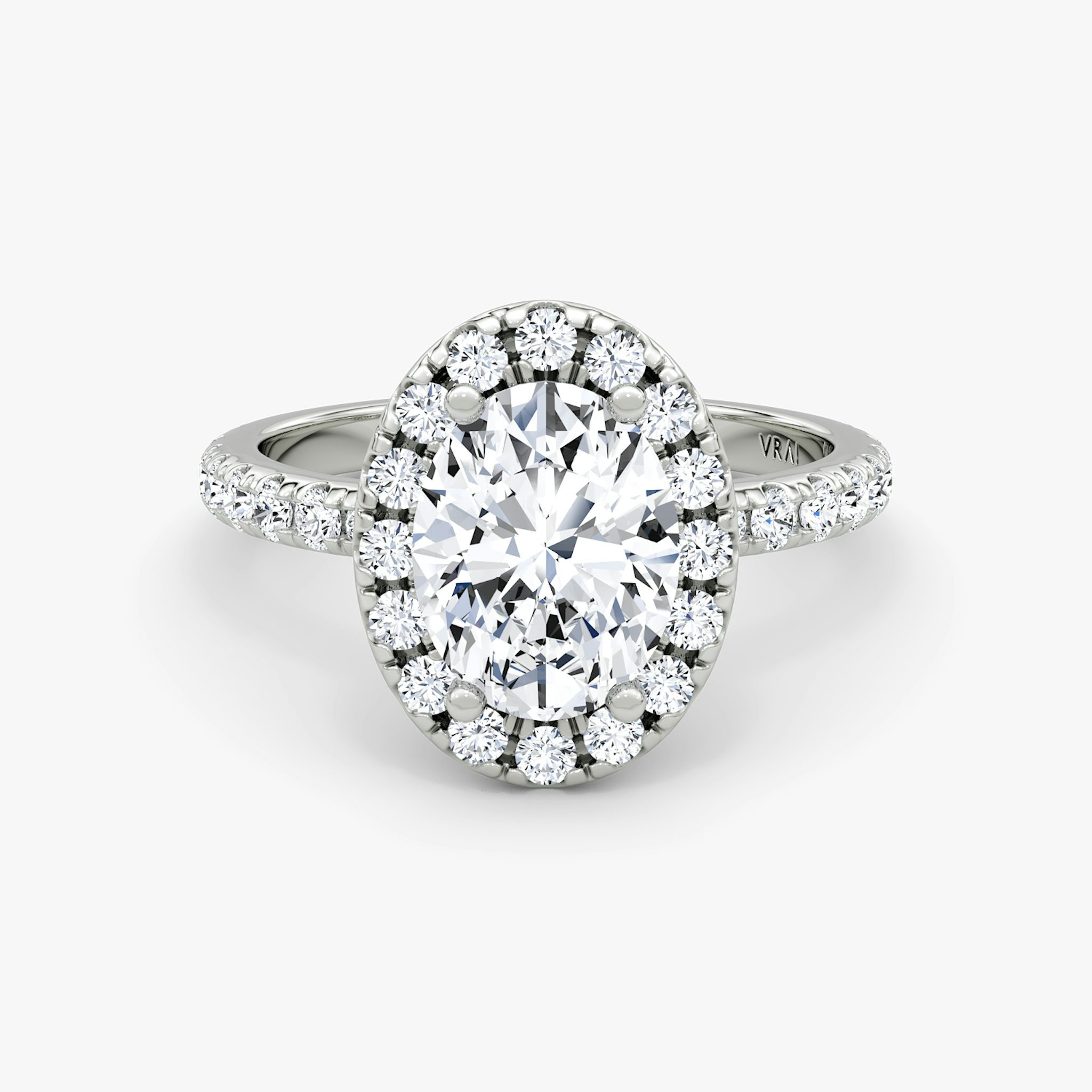The Halo | Oval | 18k | White Gold | bandAccent: Pavé | haloSize: large | diamondOrientation: vertical | caratWeight: other