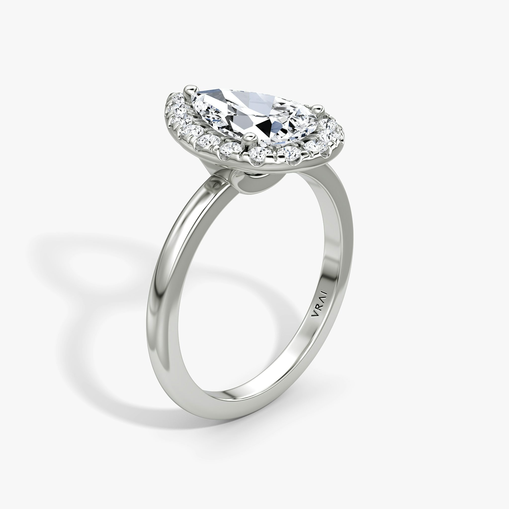The Halo | Pear | 18k | White Gold | bandAccent: Plain | haloSize: large | diamondOrientation: vertical | caratWeight: other