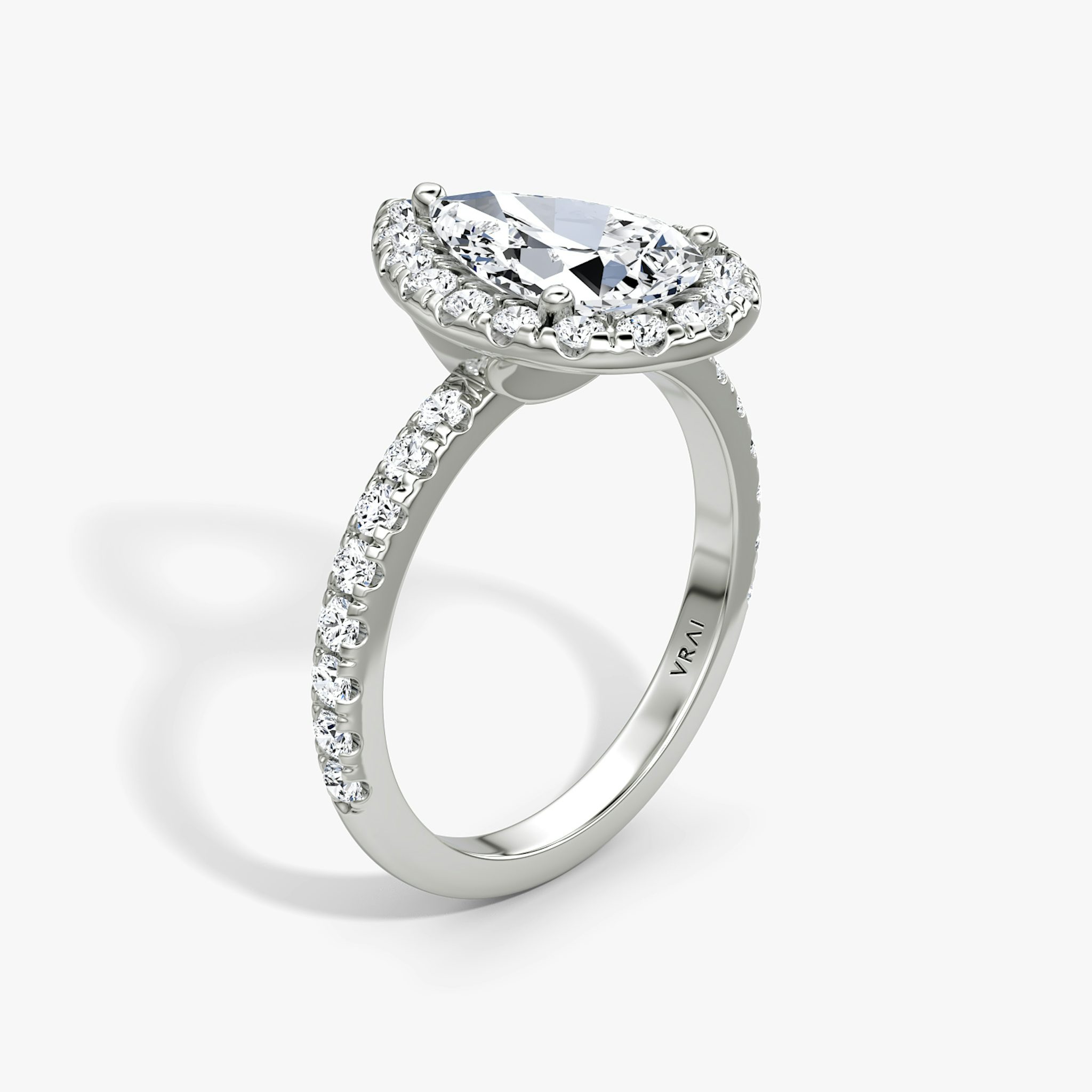 The Halo | Pear | 18k | White Gold | bandAccent: Pavé | haloSize: large | diamondOrientation: vertical | caratWeight: other