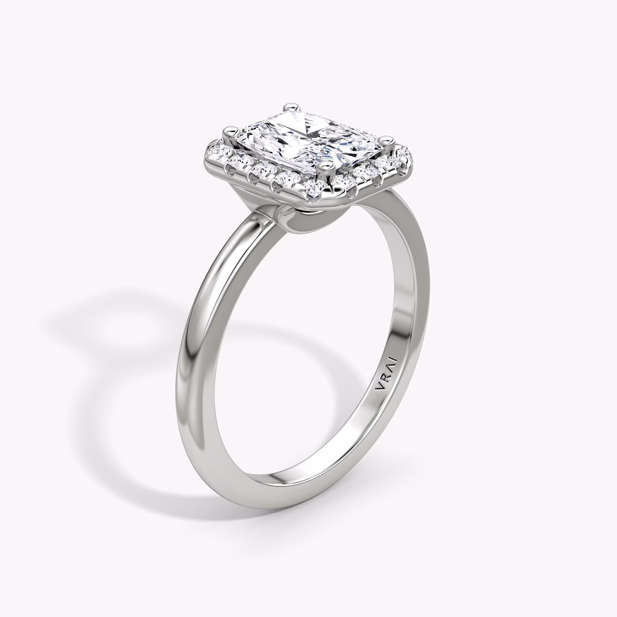 The Halo | Radiant | Platinum | bandAccent: Plain | haloSize: large | diamondOrientation: vertical | caratWeight: other