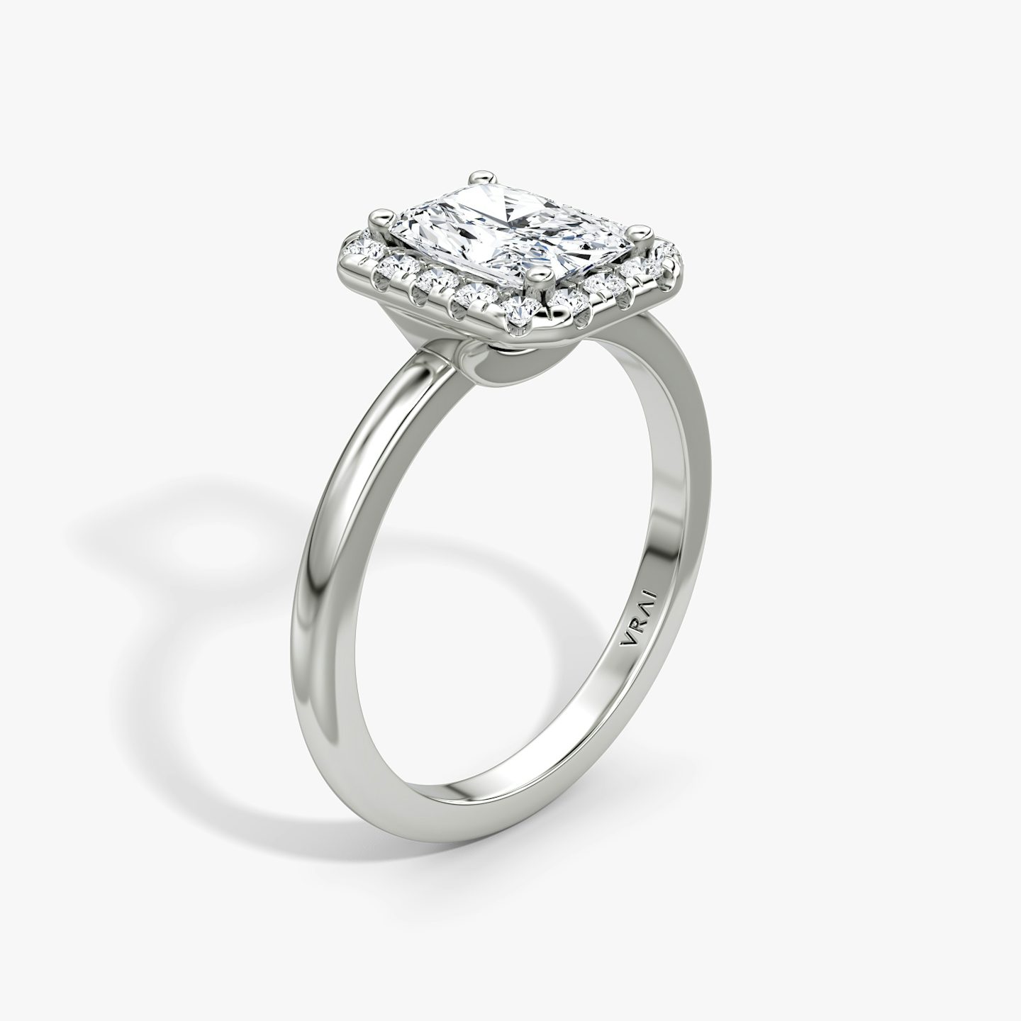 Anillo de compromiso Halo | Radiante | Platino | bandAccent: Simple | haloSize: large | diamondOrientation: vertical | caratWeight: other