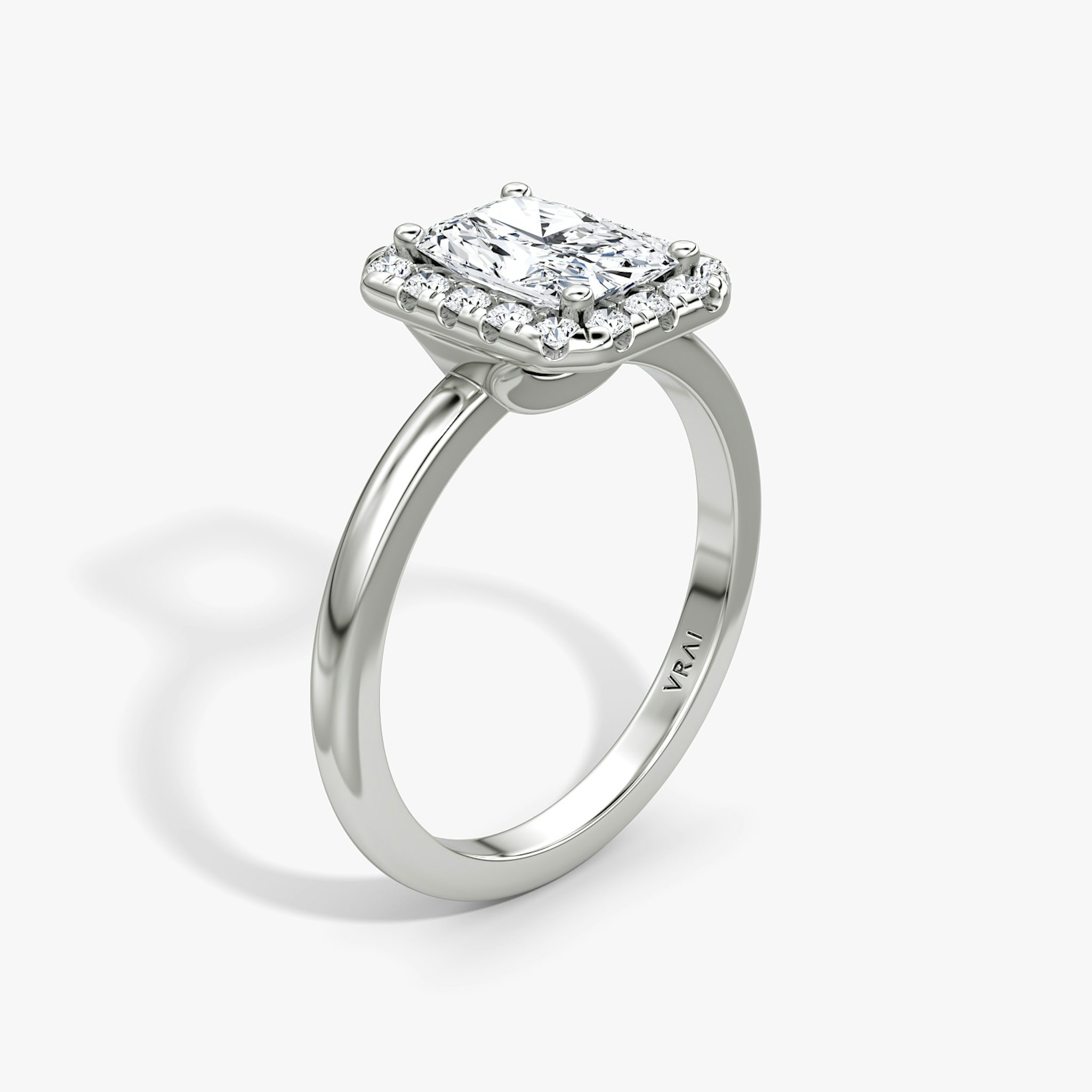The Halo | Radiant | Platinum | bandAccent: Plain | haloSize: large | diamondOrientation: vertical | caratWeight: other