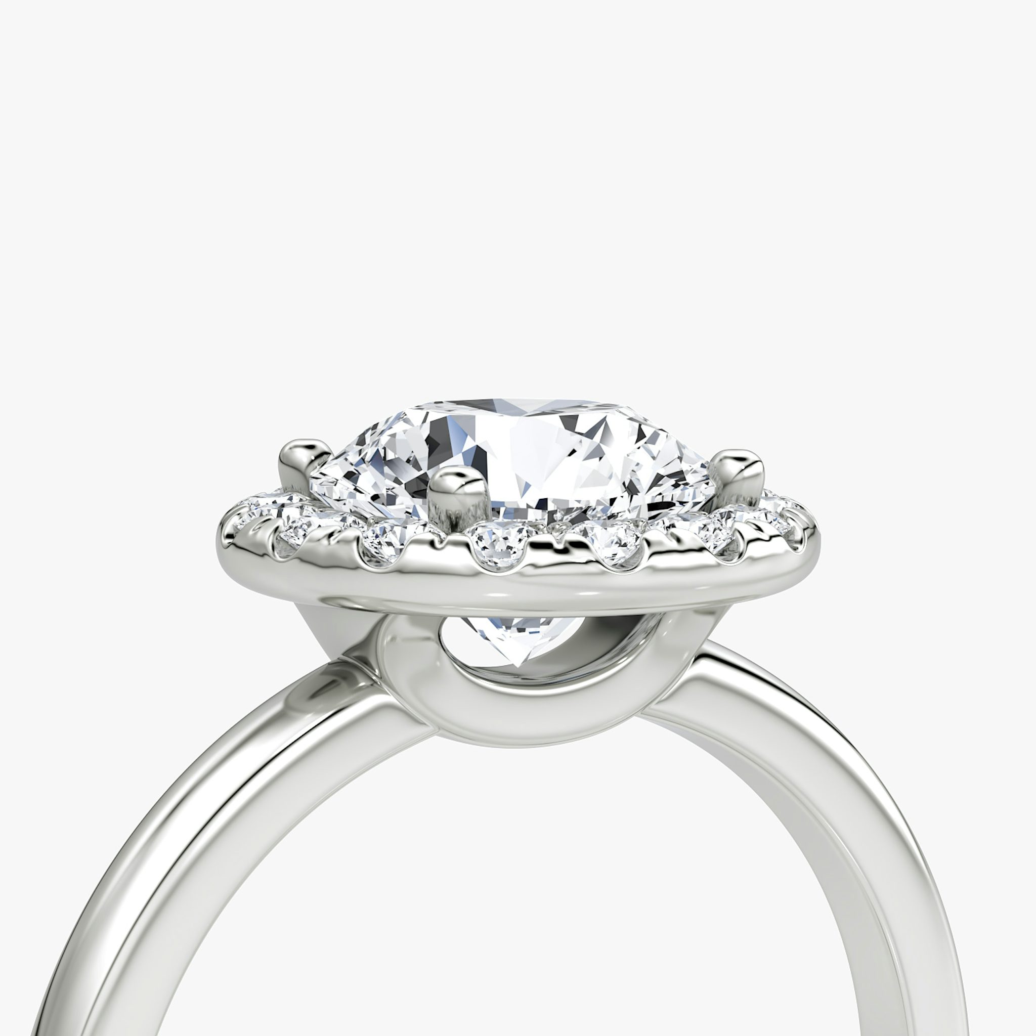 The Halo | Round Brilliant | Platinum | bandAccent: Plain | caratWeight: other | haloSize: large | diamondOrientation: vertical