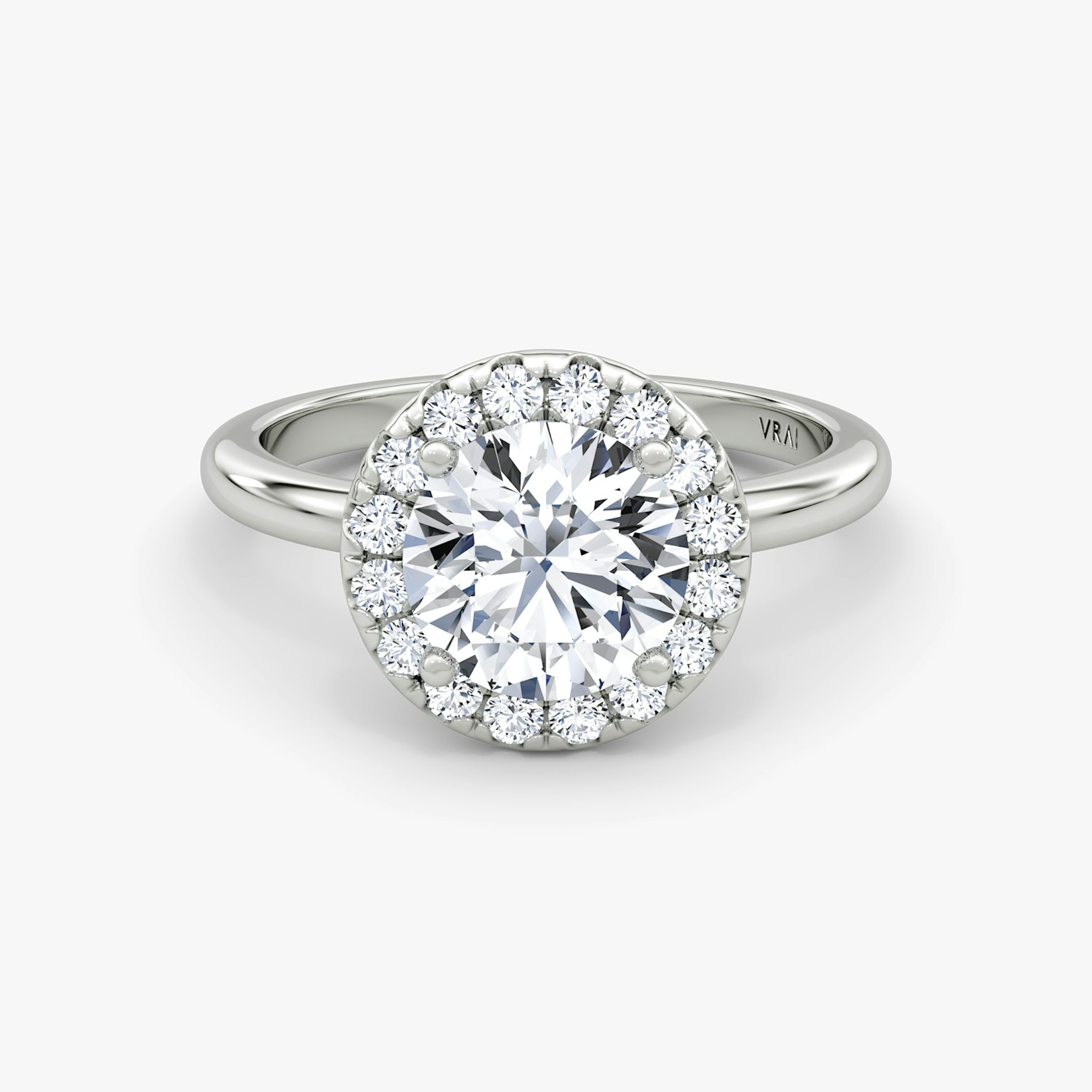 The Halo | Round Brilliant | Platinum | bandAccent: Plain | caratWeight: other | haloSize: large | diamondOrientation: vertical