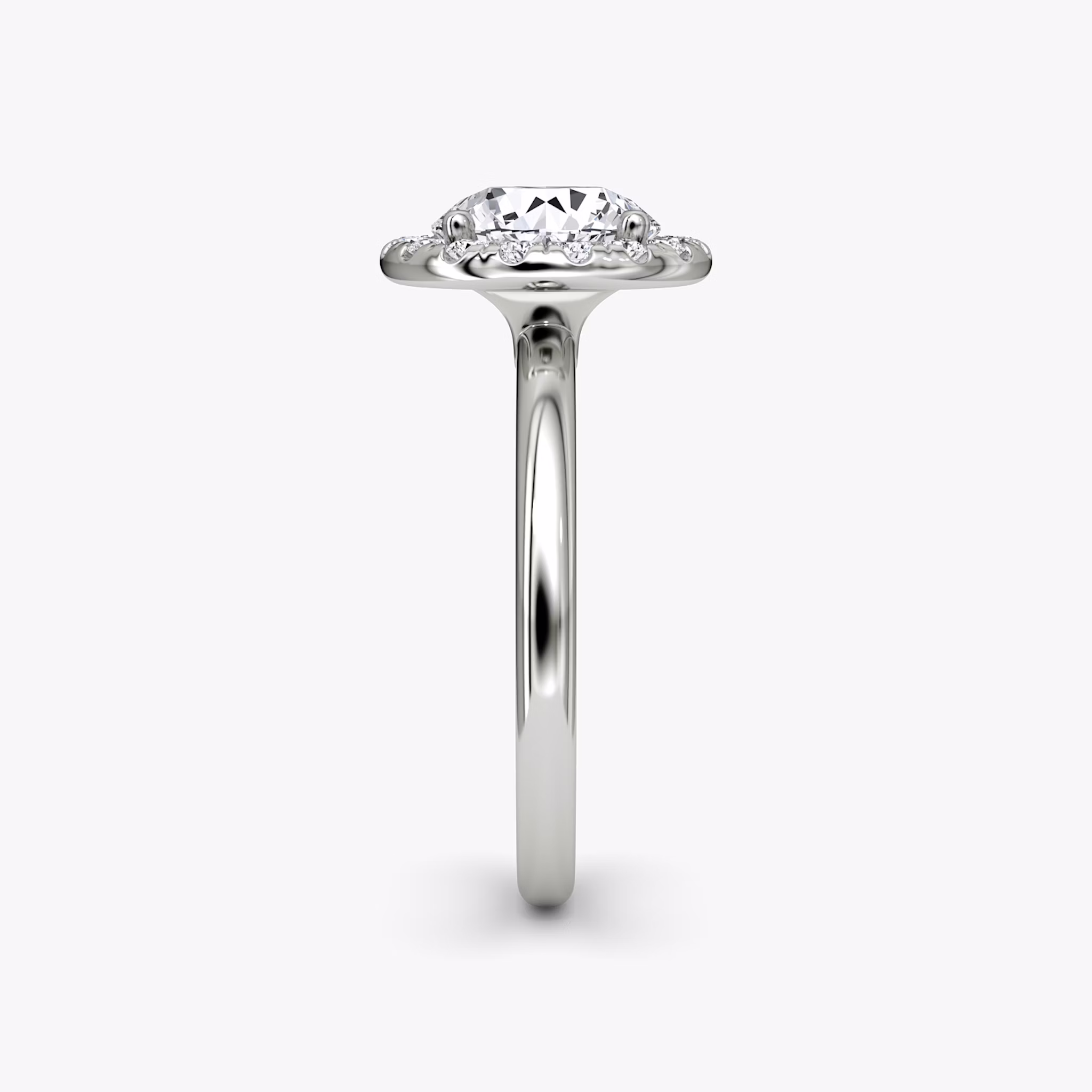 The Halo | Round Brilliant | Platinum | bandAccent: Plain | caratWeight: other | haloSize: large | diamondOrientation: vertical