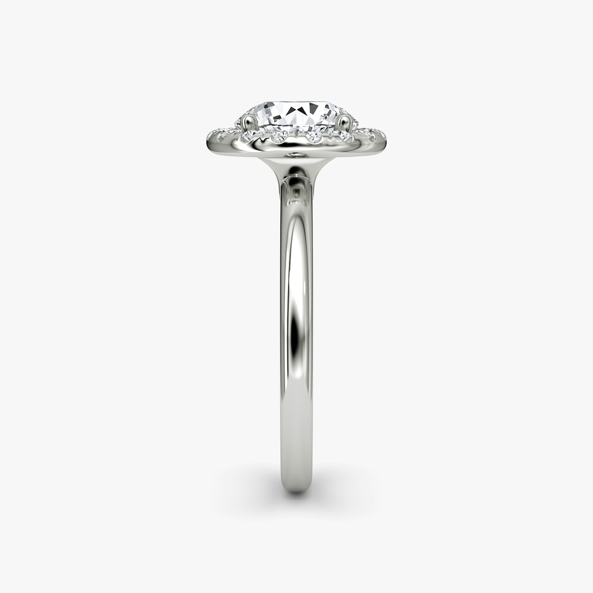 The Halo | Round Brilliant | Platinum | bandAccent: Plain | caratWeight: other | haloSize: large | diamondOrientation: vertical