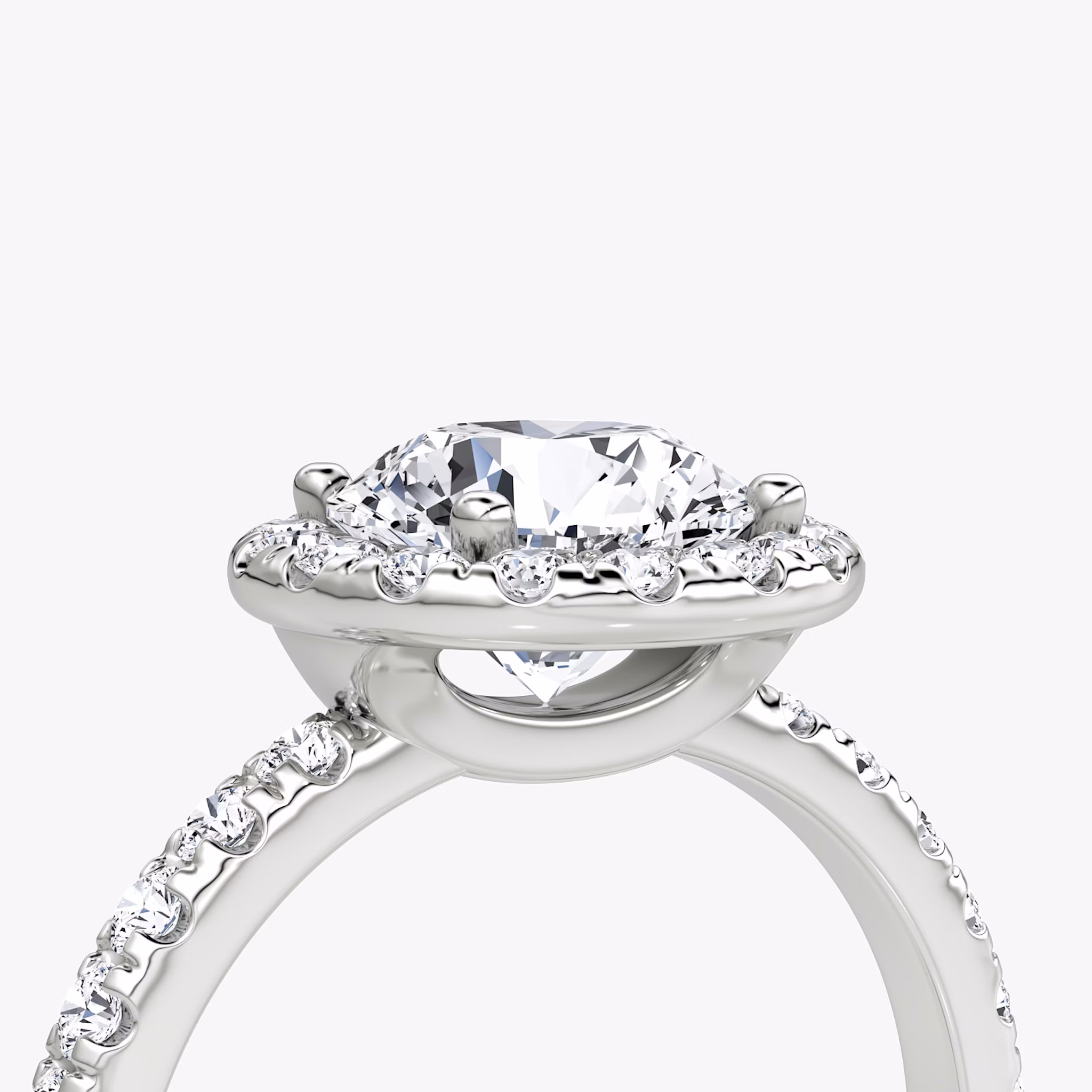 The Halo | Round Brilliant | Platinum | bandAccent: Pavé | caratWeight: 1.5ct | haloSize: large | diamondOrientation: vertical
