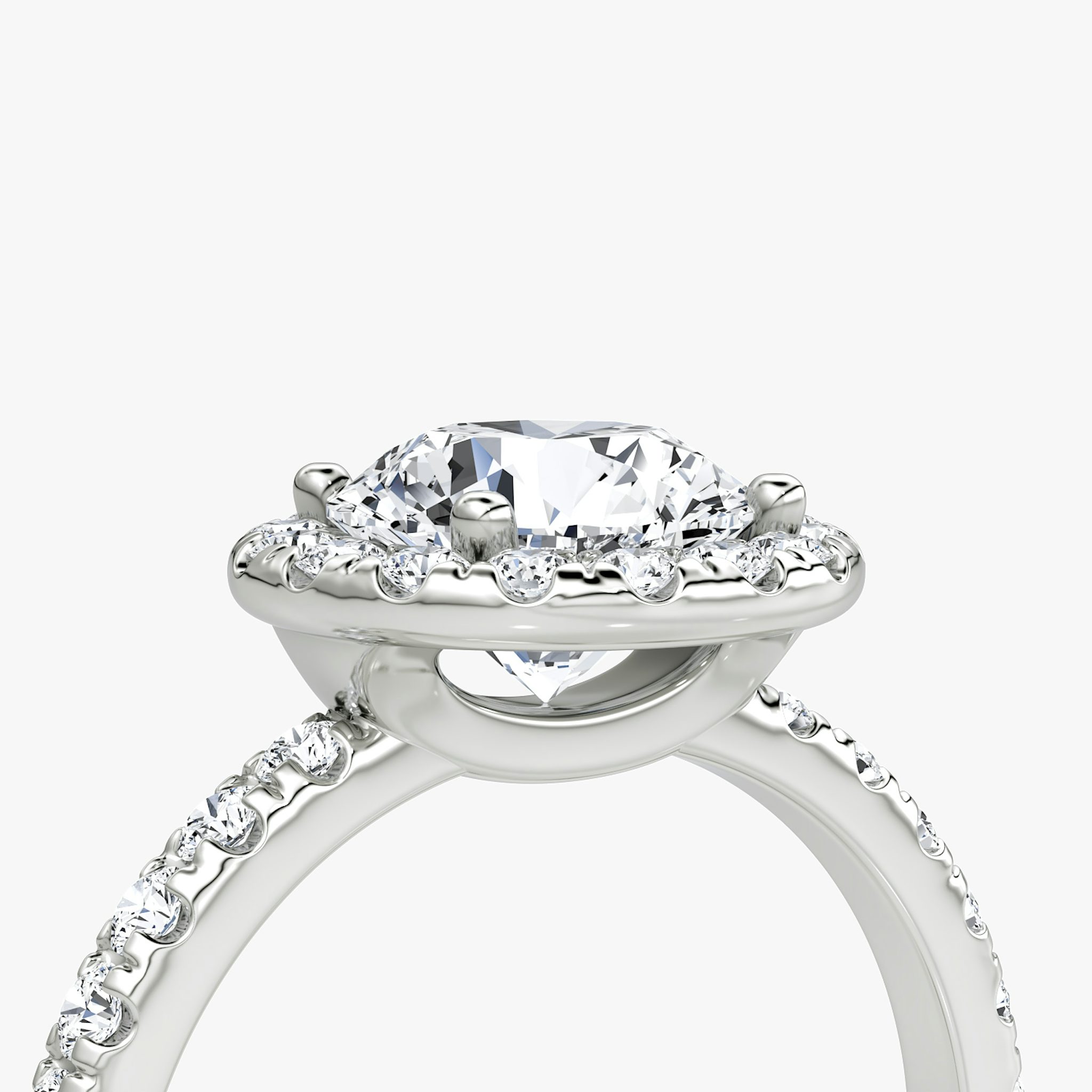 The Halo | Round Brilliant | Platinum | bandAccent: Pavé | caratWeight: 1.5ct | haloSize: large | diamondOrientation: vertical